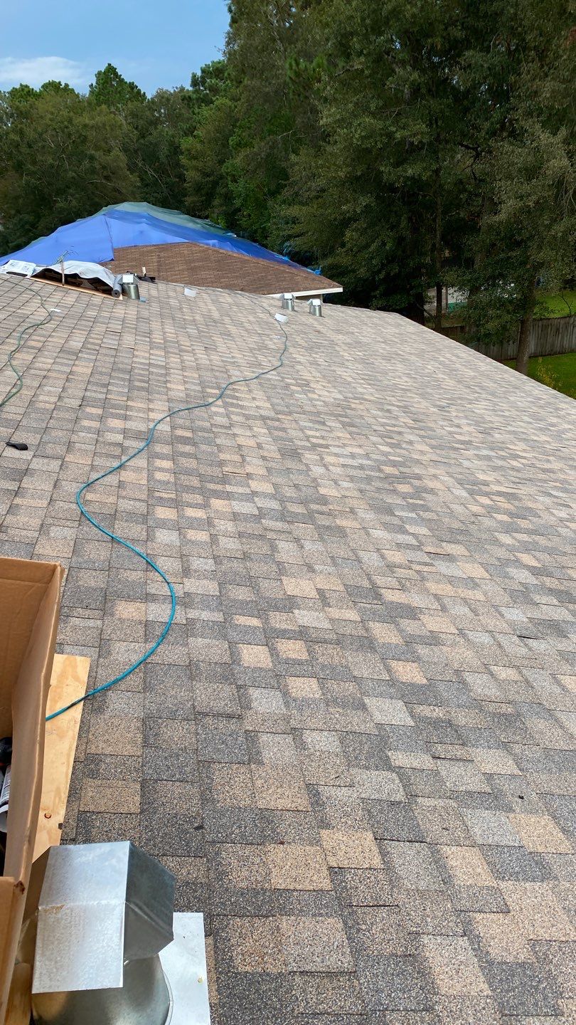 Commercial Roofing Installation using Roof Replacement by American Roofing & Construction LLC