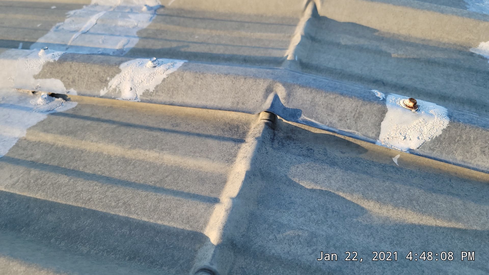Commercial Roofing Installation using Aldocoat Coatings by Hostetler Roofing