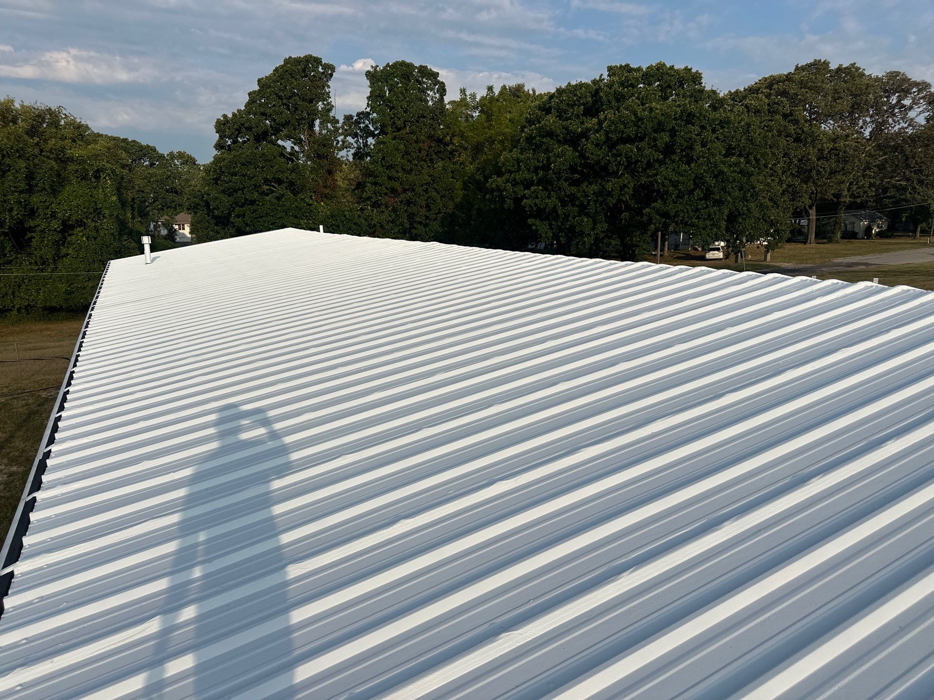 Commercial Roofing Install - Metal Coatings Restoration System  - Color White  by Titan Commercial & Residential Roofing 