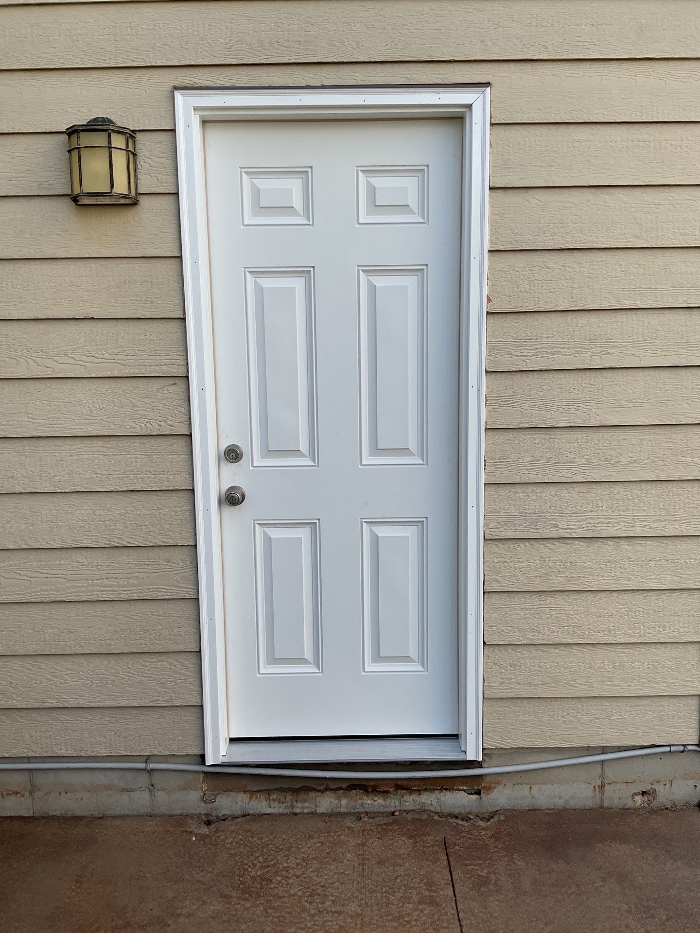 Sioux Falls Exterior Siding Replacement and Custom Deck Upgrade by Select Painting, Coatings & Garage Cabinets