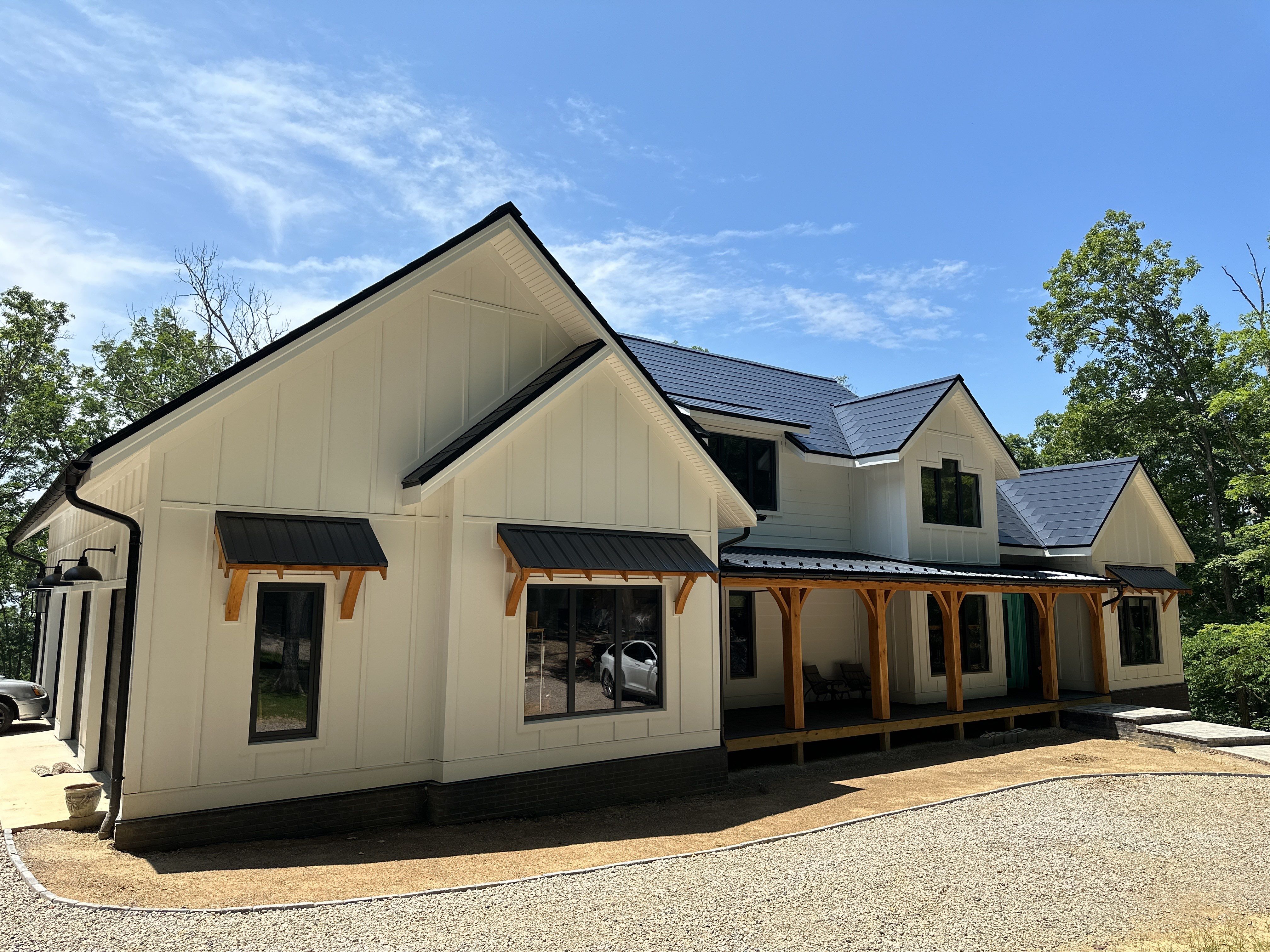 New Construction with Tesla Solar Roof + Powerwall by American Home Contractors