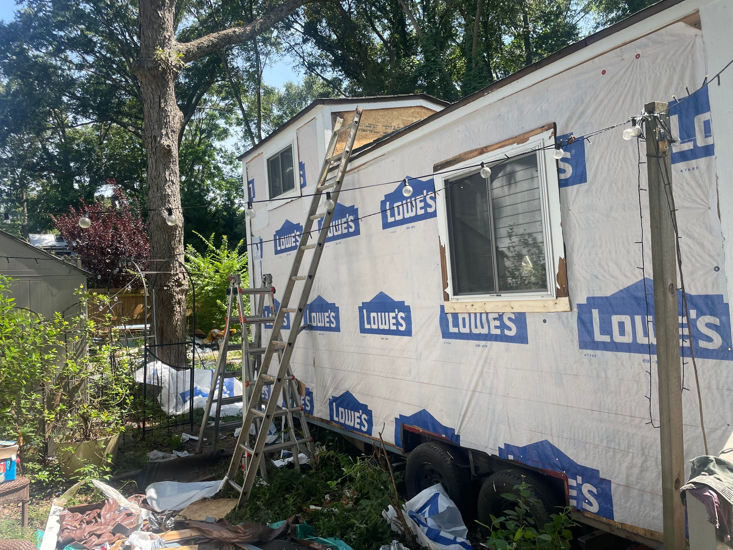 tiny home remodel- siding,paint,roofing by Nailed It Roofing & Remodeling LLC