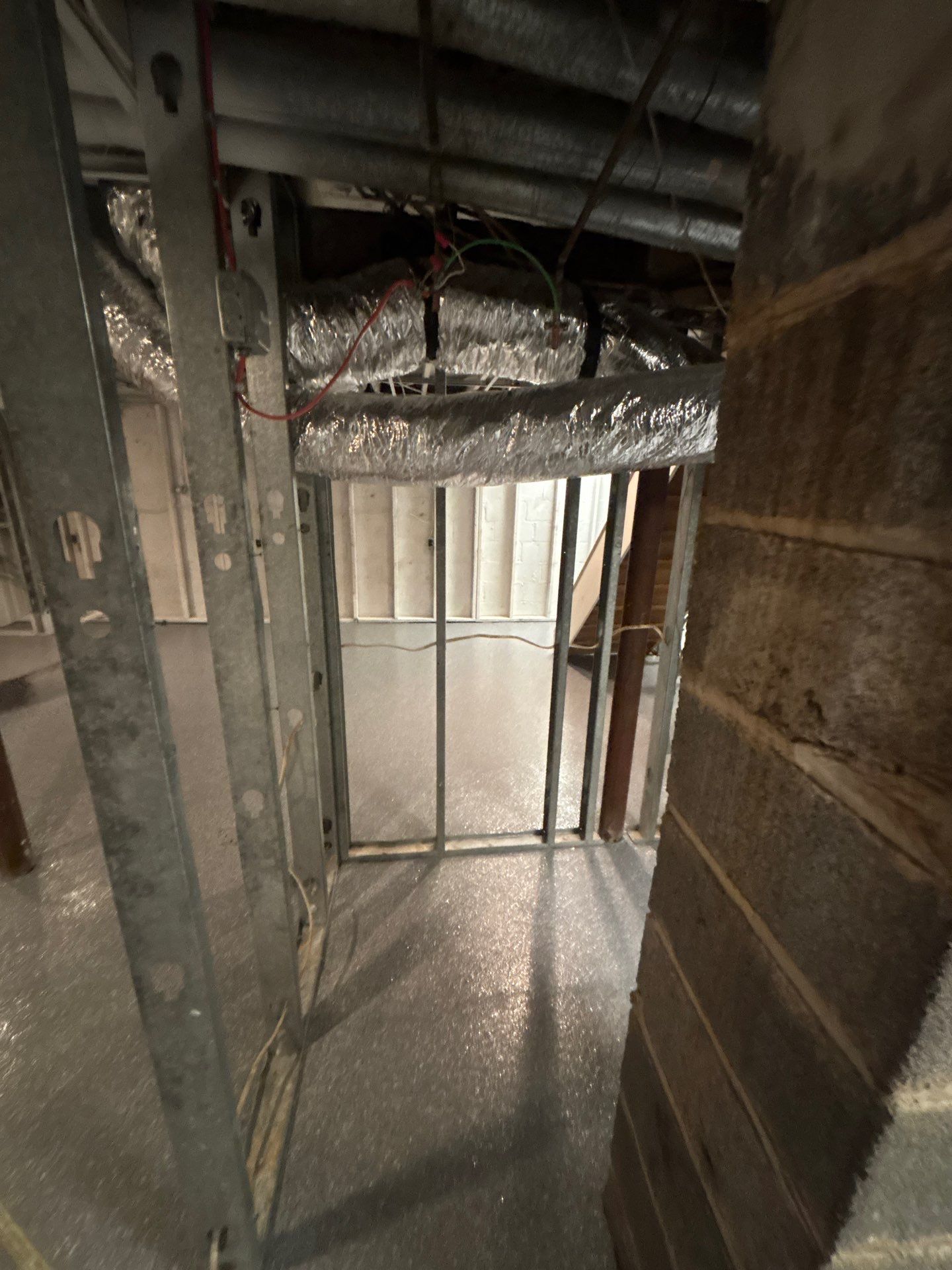 Basement Concrete Floor Coating with Penntek Flake System by Spectrum Painting, LLC