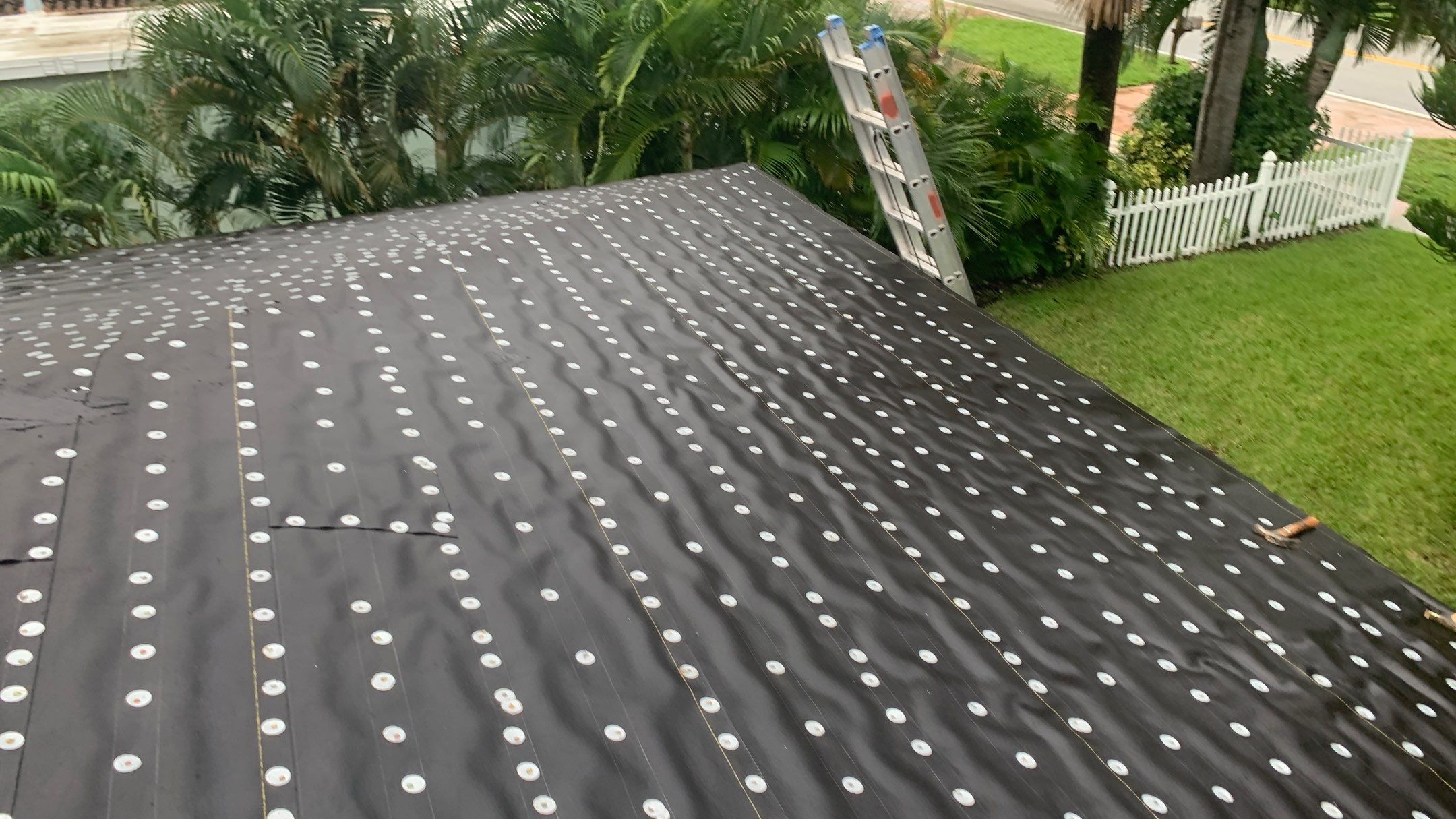 Residential Roofing Installation using 1" Nail strip metal roof by BLUES BROTHERS ROOFING