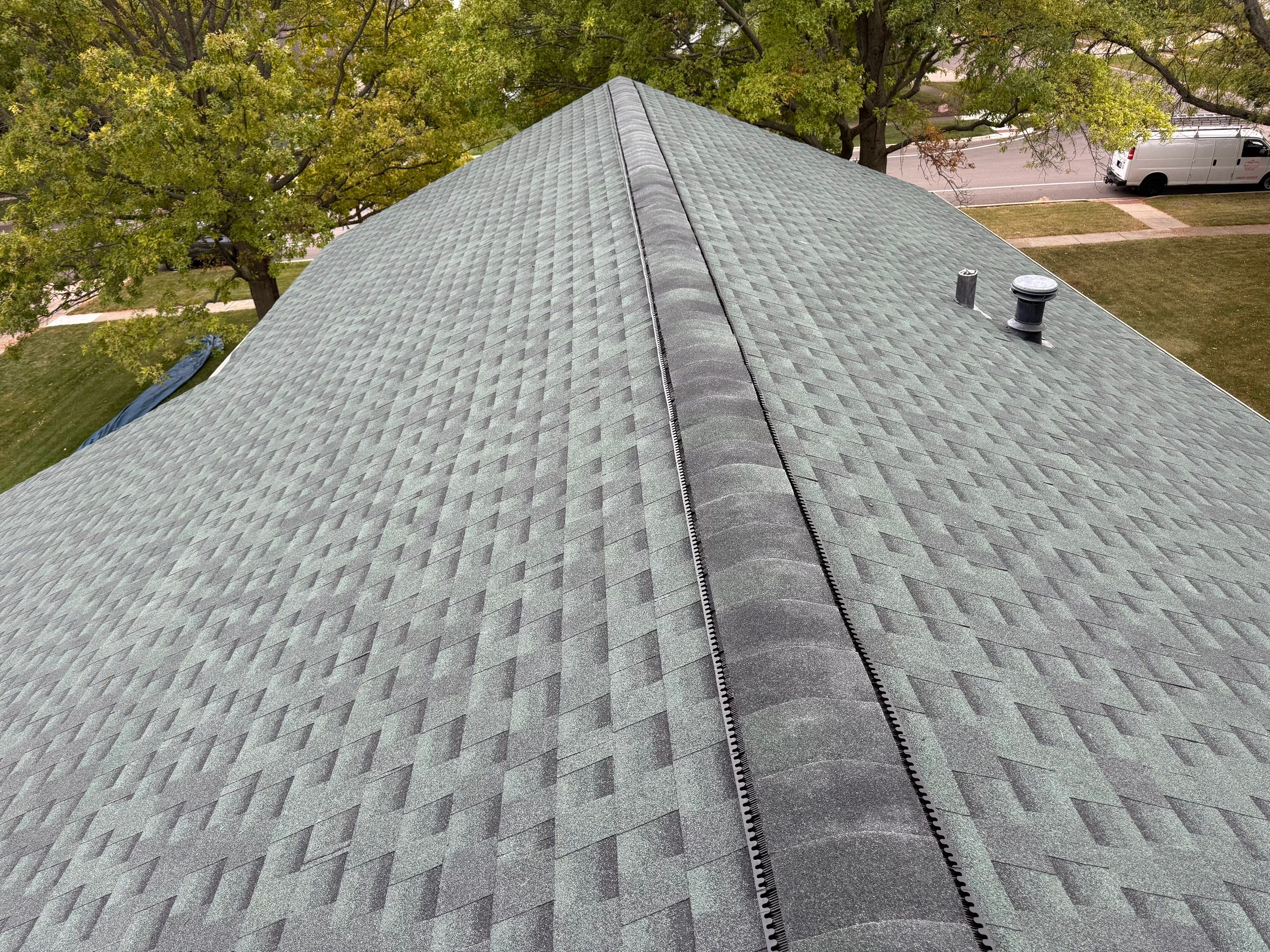 Roof & gutters by Optimal Home Improvement 