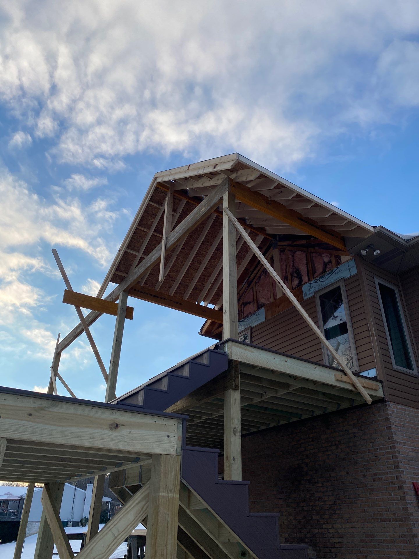 Deck and Roof Build by Cousins Roofing Siding & Decks