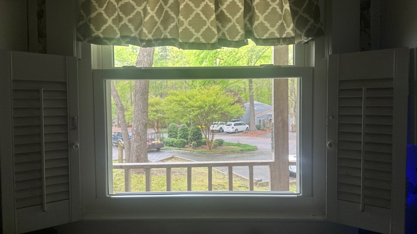 White Vinyl Double-Hung Window Replacement in Fuquay-Varina by The Remodeling Company