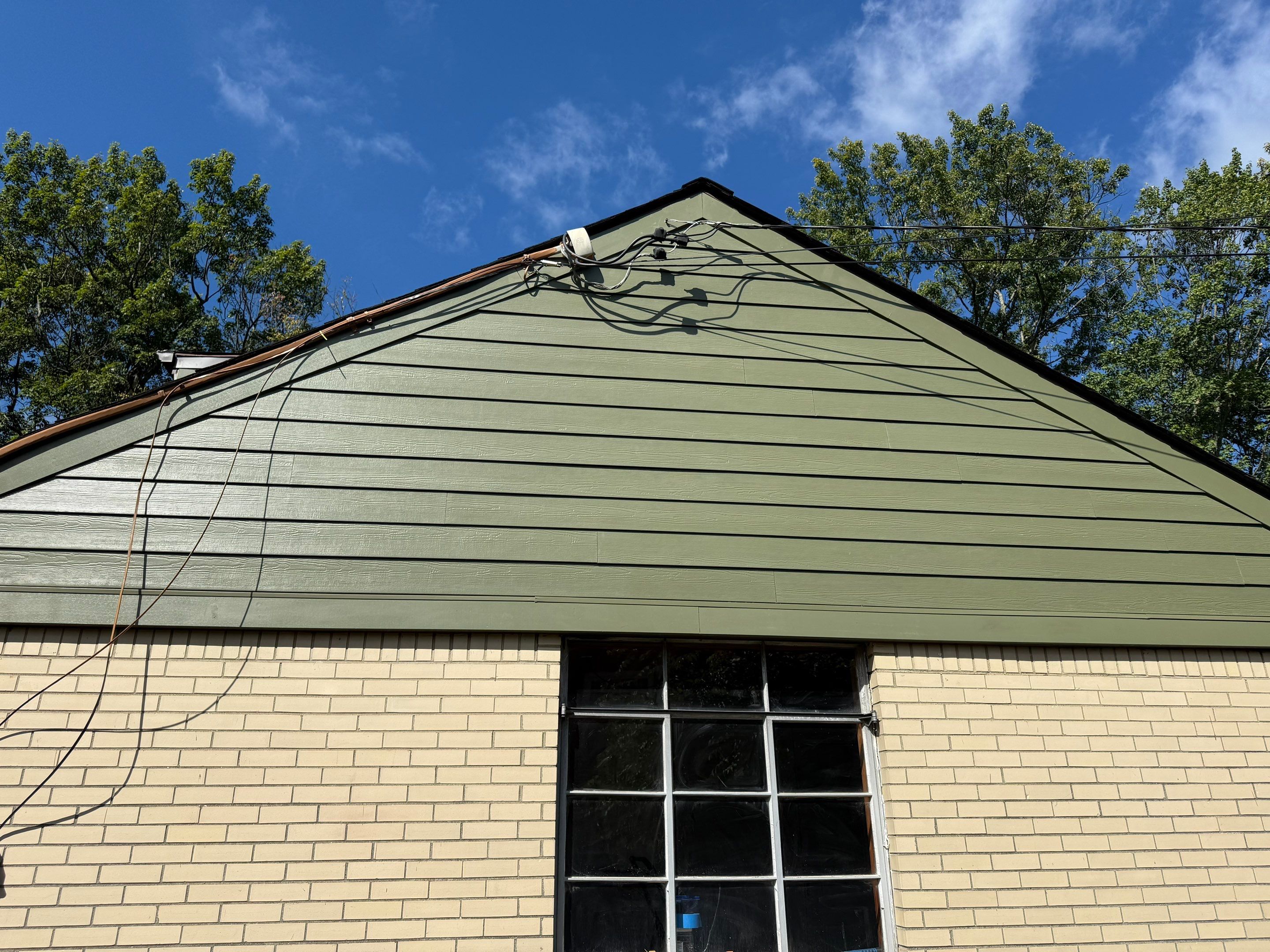 Hardie siding  by Cousins Roofing Siding & Decks