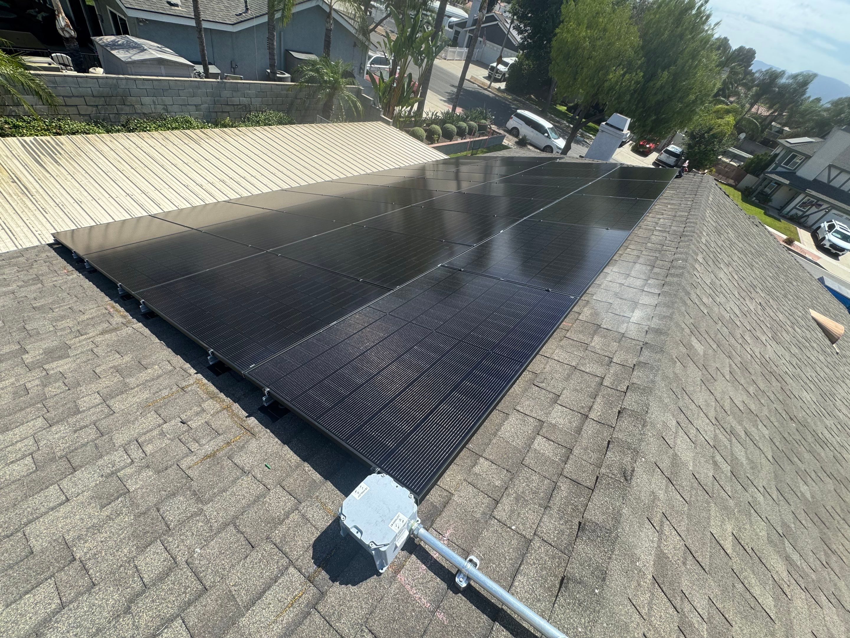 Residential Solar Array and Dual Tesla Powerwall Storage in Corona by VIBE SOLAR