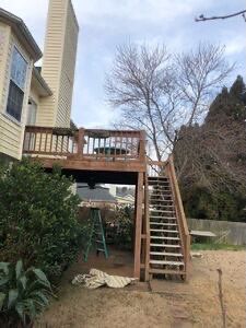 Elevated Wooden Deck Replacement and Under-Deck Ceiling in Cartersville by Swift Home Renovations