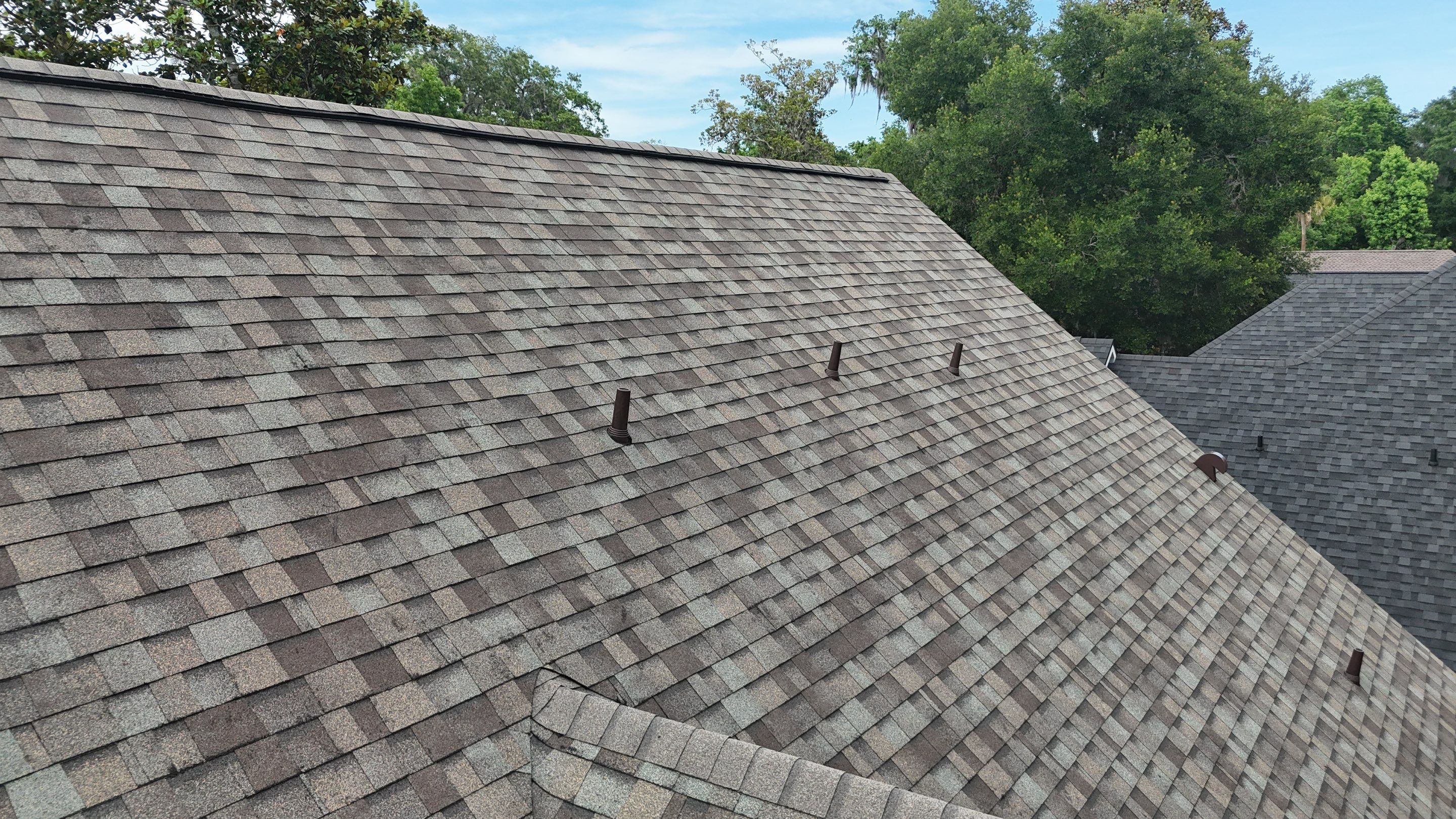 Full Residential Roofing Installation for Multi-Gabled Flagler Beach Home by Trinity Restoration and Roofing LLC
