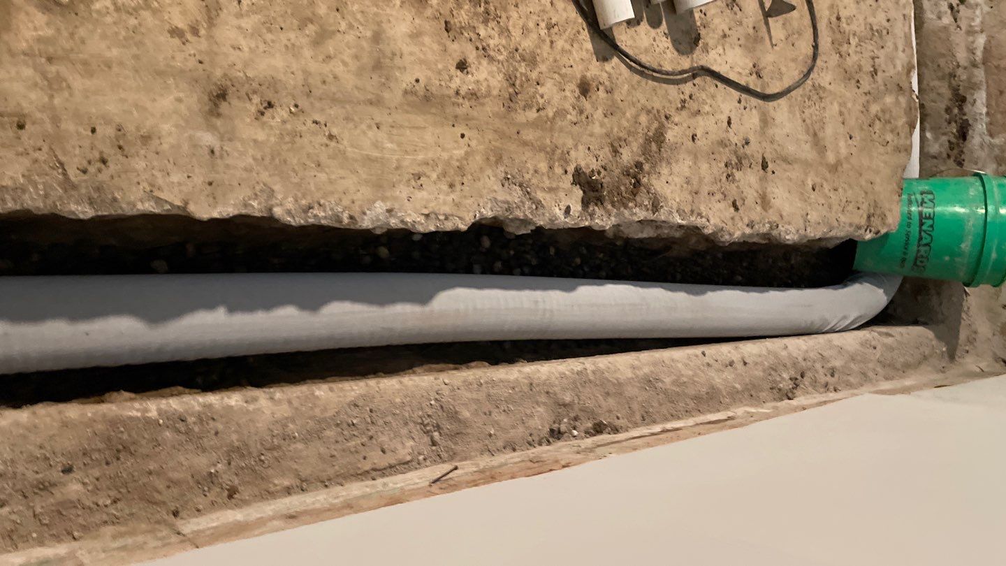 Basement Drain Tile & Sump Pump in Northeast Minneapolis by Waterproofing Northeast