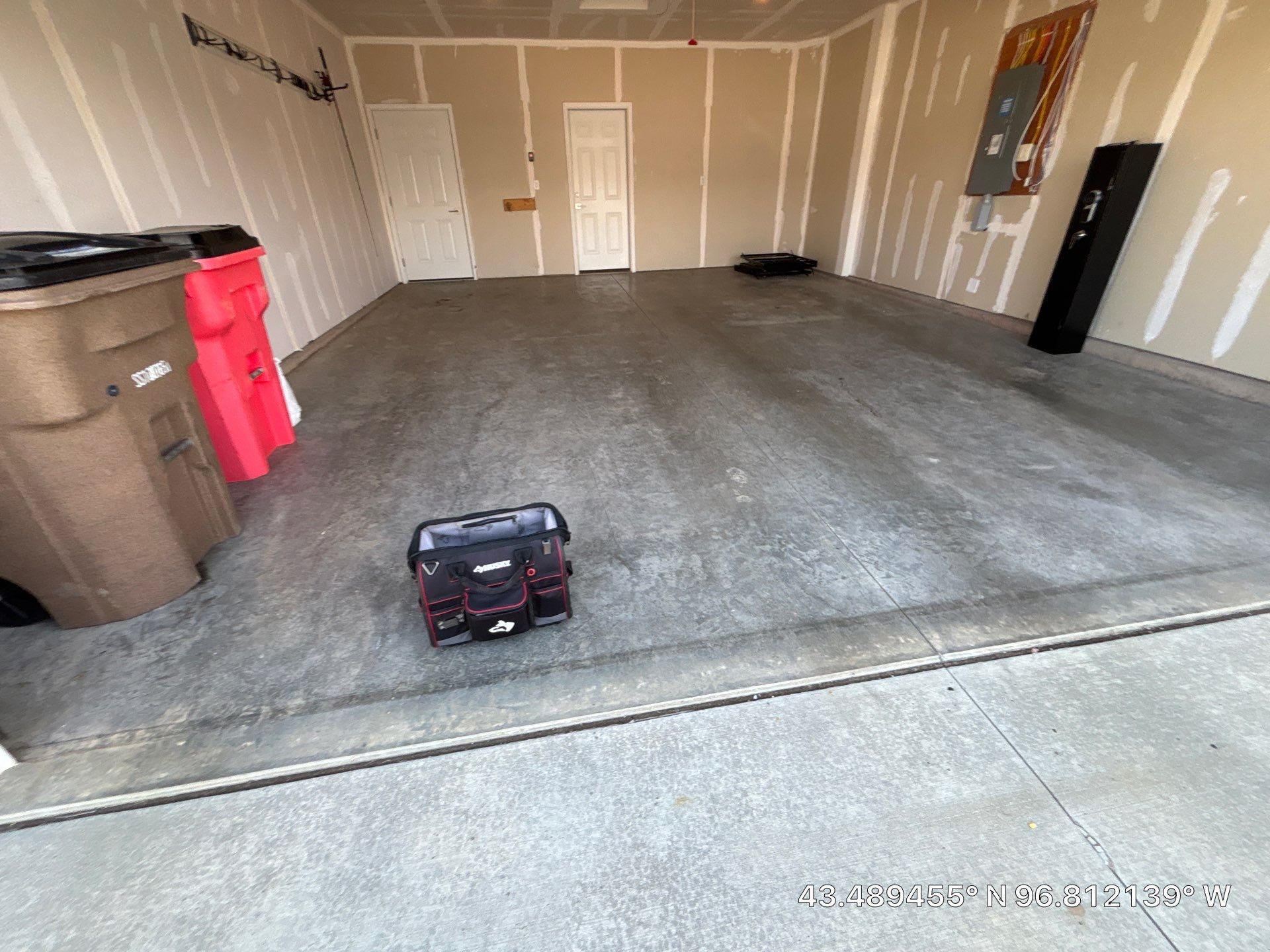 Custom Epoxy Garage Floor and Patio Coating in Sioux Falls by Select Painting, Coatings & Garage Cabinets