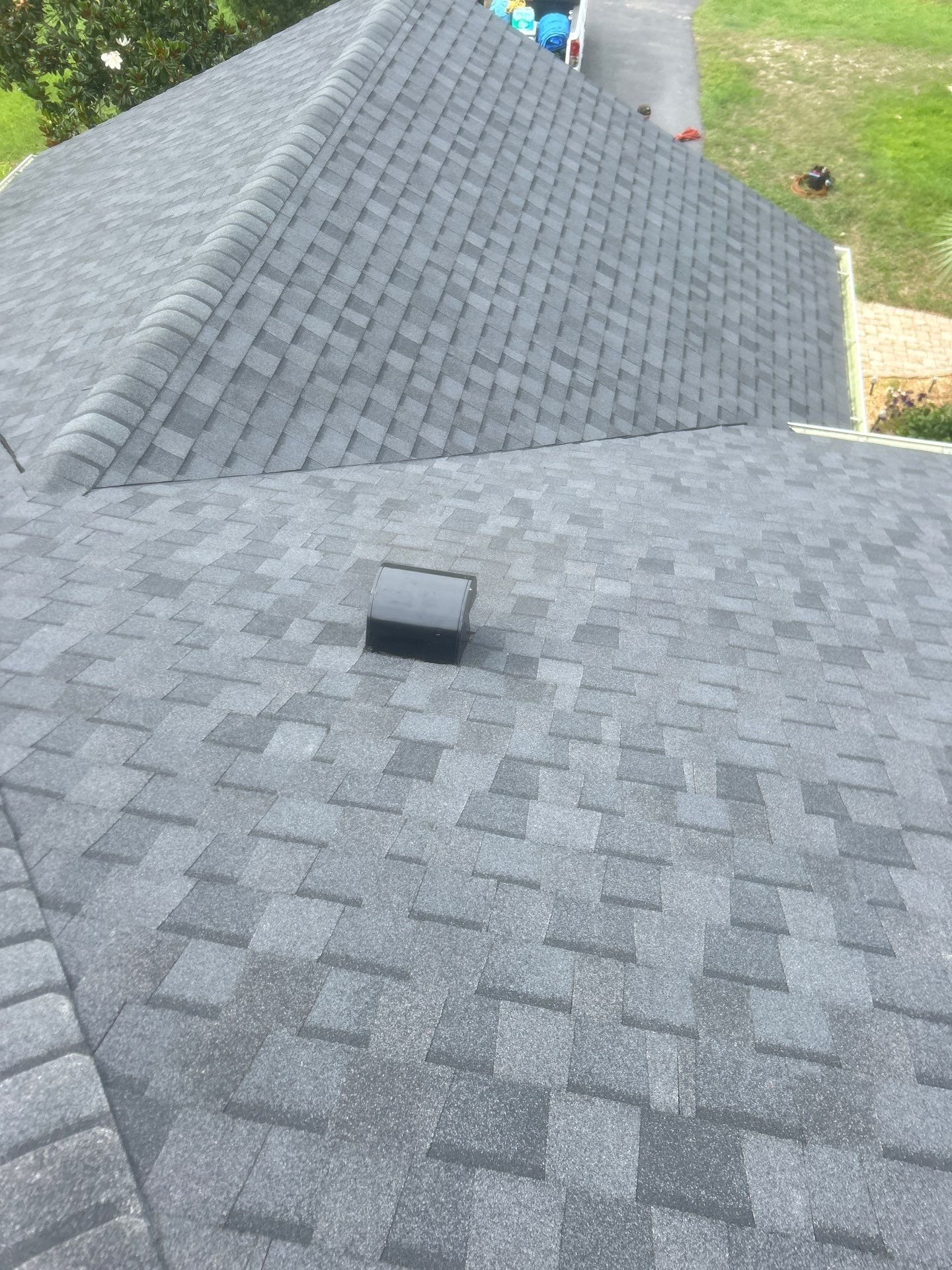 Architectural Shingle Roof Replacement and Skylight Installation in Port Orange by Tip Top Roofing Co., Inc.