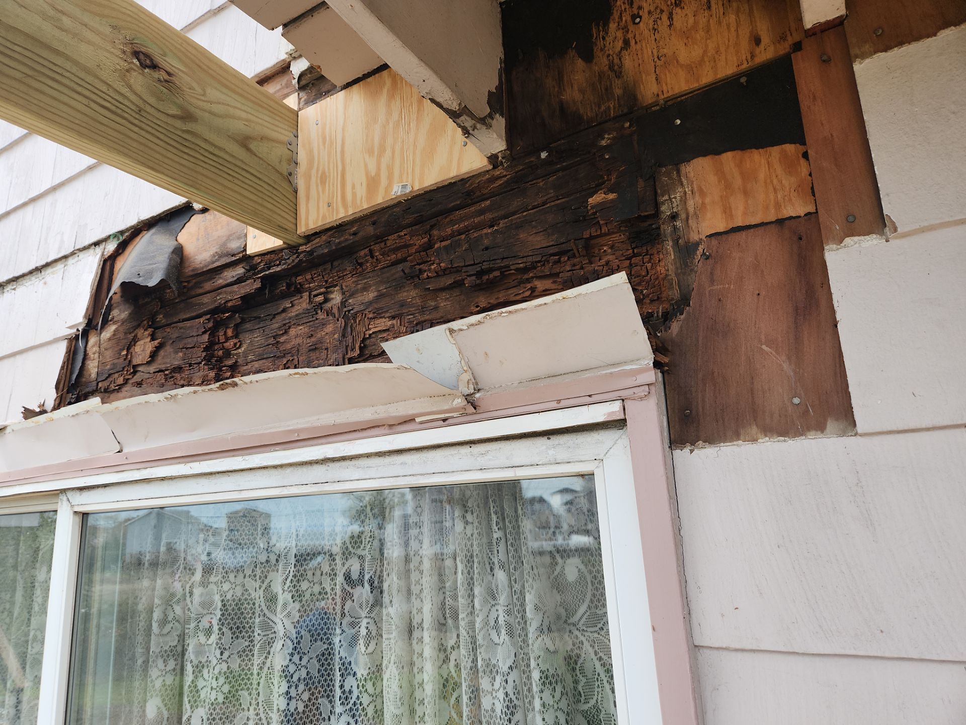 Milford Exterior Renovation Featuring Custom Siding and Wood Deck Installation by A Plus Exterior