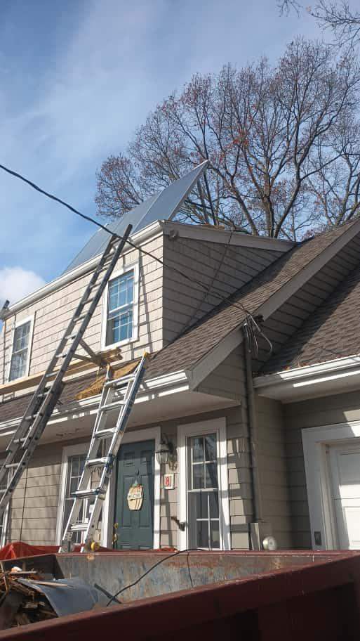 Lexington Complete EPDM Roof with Dormer Cedar Shake & Trim Restoration by Mighty Dog Roofing of Greater Middlesex County