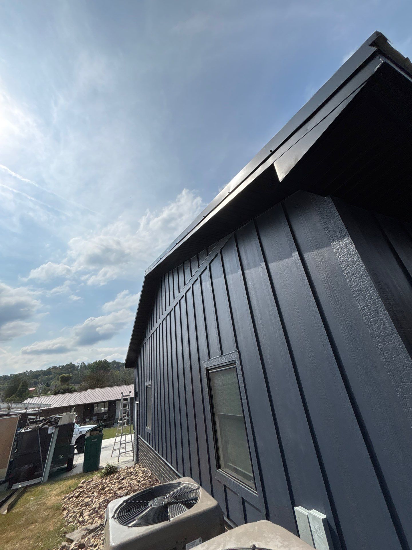 Siding and Metal Roof by Fahey Roofing + Contracting