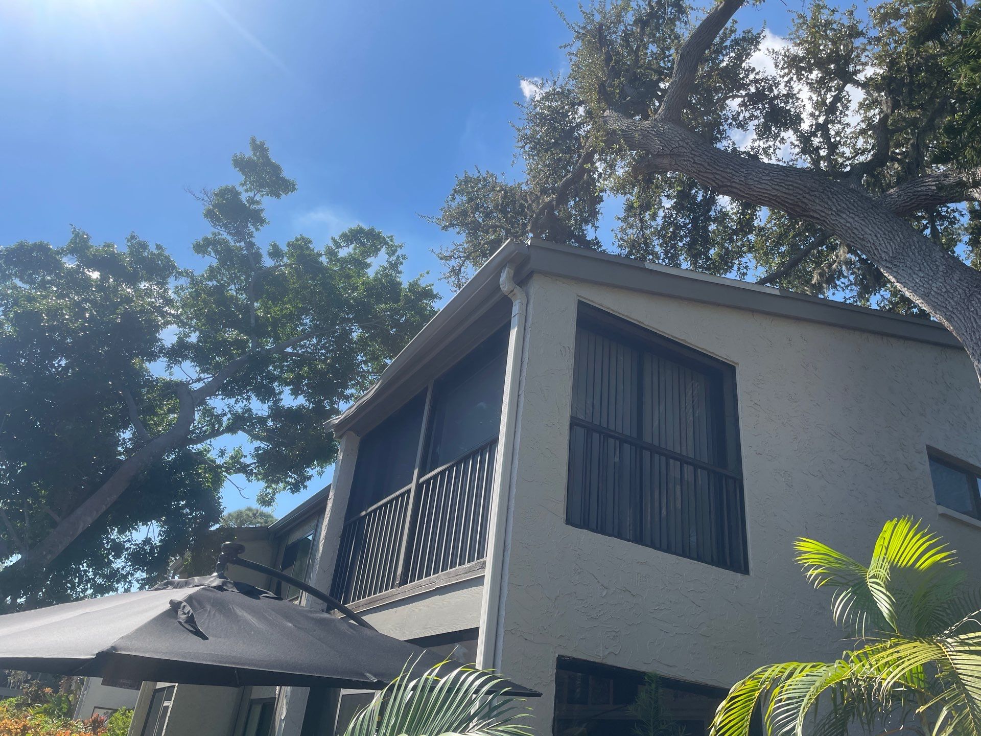 White Gutters Repair and Installation in Sarasota FL by Gutter Professors
