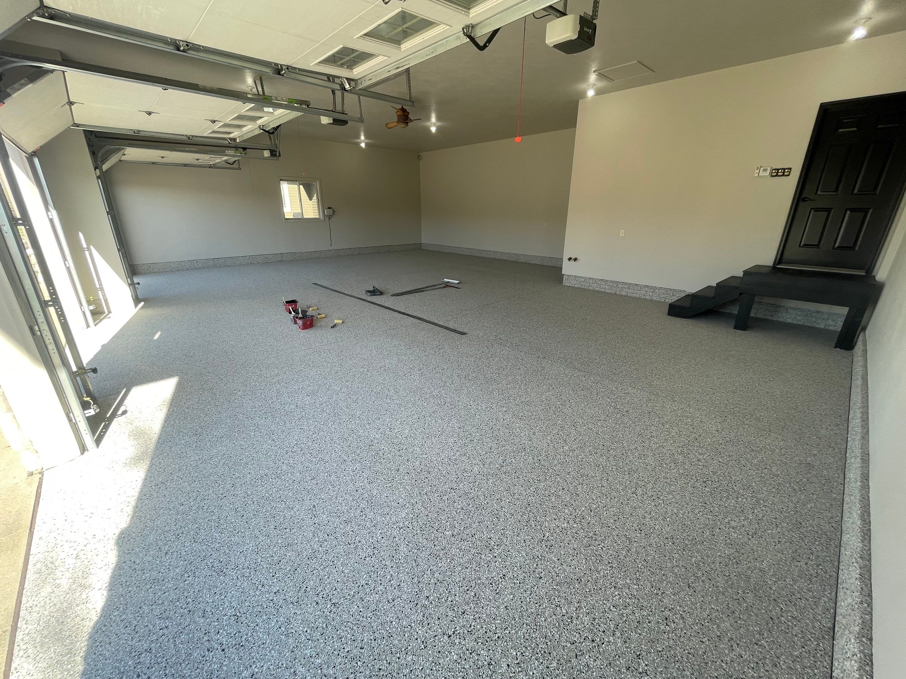 Multi-Car Garage Epoxy Floor Coating in Beresford by Select Painting, Coatings & Garage Cabinets