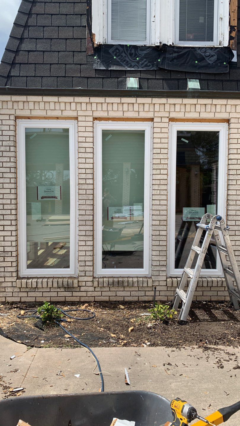 Mansard Charm by Bayfront Roofing and Construction