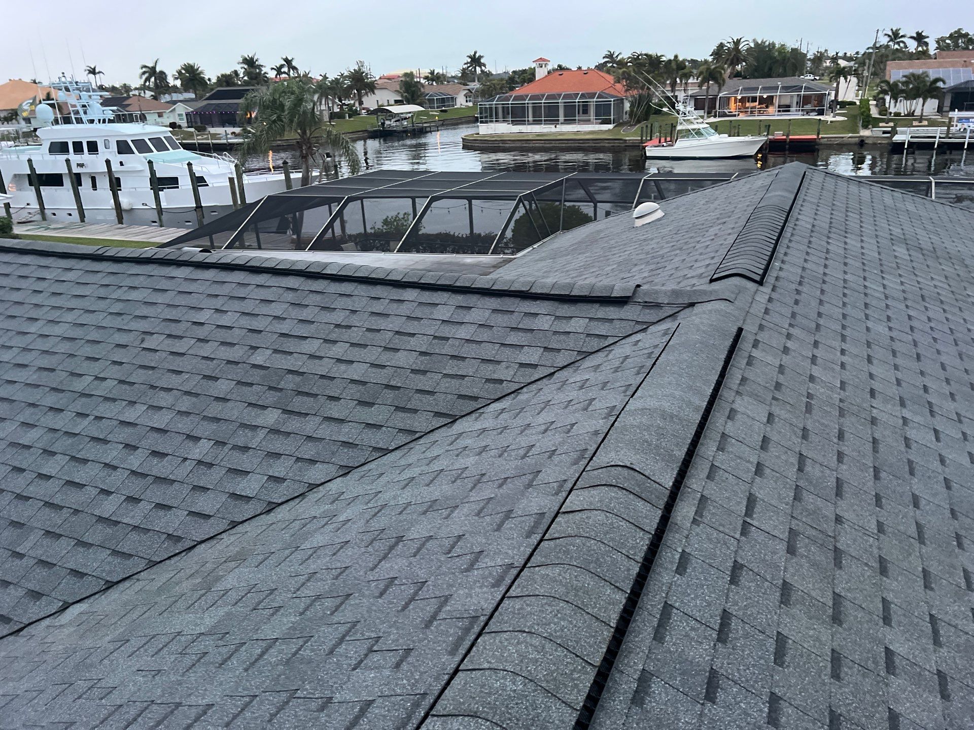 Residential Roofing Installation using Pinnacle Pristine Shingle in Pewter Gray by Durabilis Roofing INC
