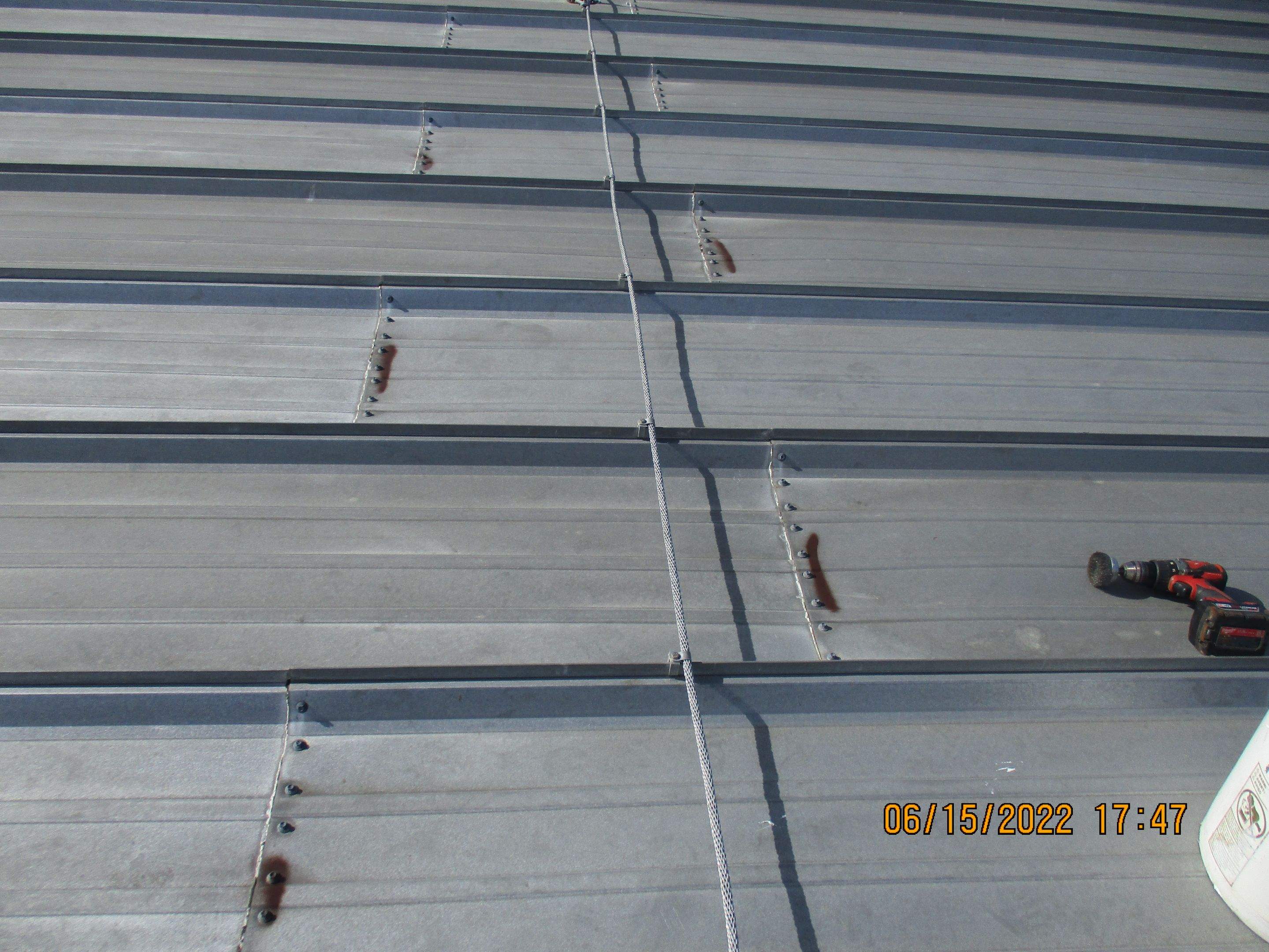 Calder Casino & Race Track Partial Metal Restoration  using #924 Eterna-Sil Premium Silicone Roof Coating by Morton Roofing, Inc.