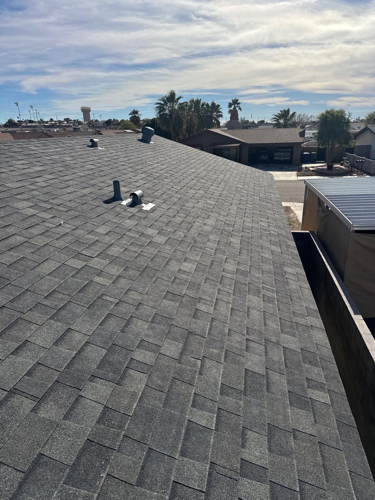 Estate Gray Shingles by Reimagine Roofing