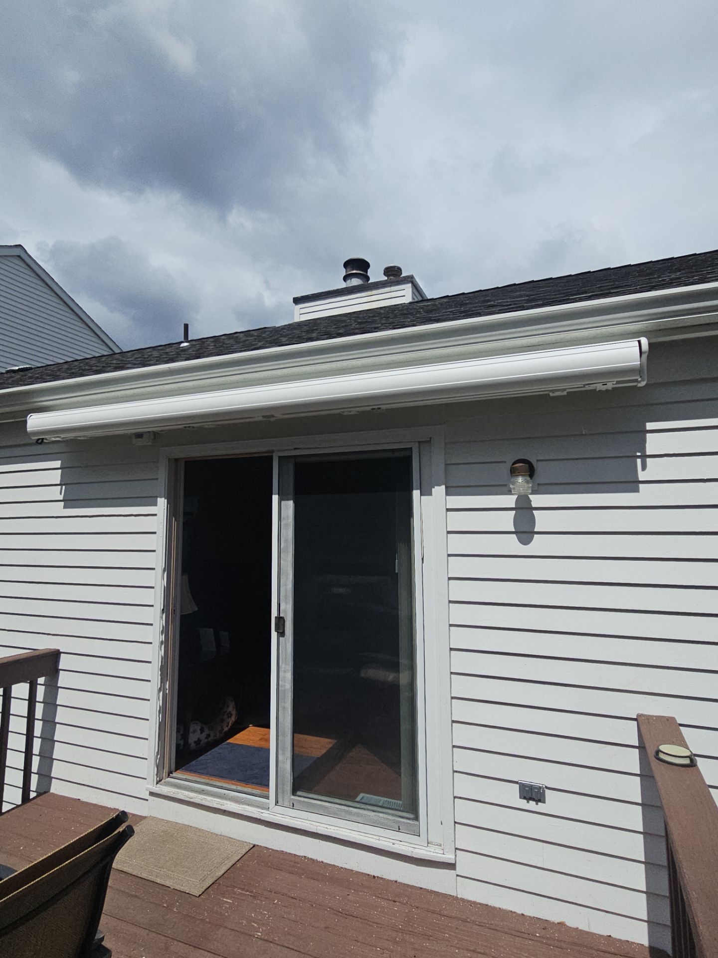 Retractable Awning Installation & Exterior Upgrade by DiGiorgi Roofing and Siding Inc