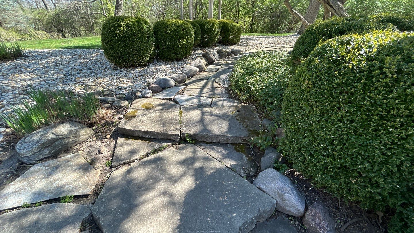 natural stone using Algaecide, soft wash soap by Northern Power Washing LLC.