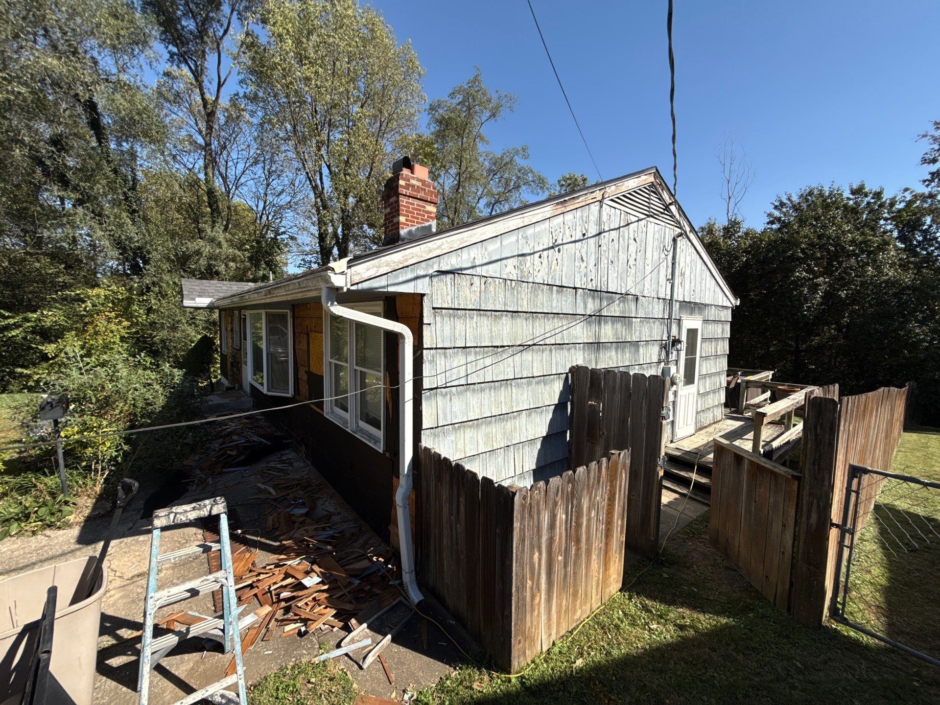 Feeling Blue in Weston Mo - Time for a Makeover by EEC Windows, Siding & Roofing