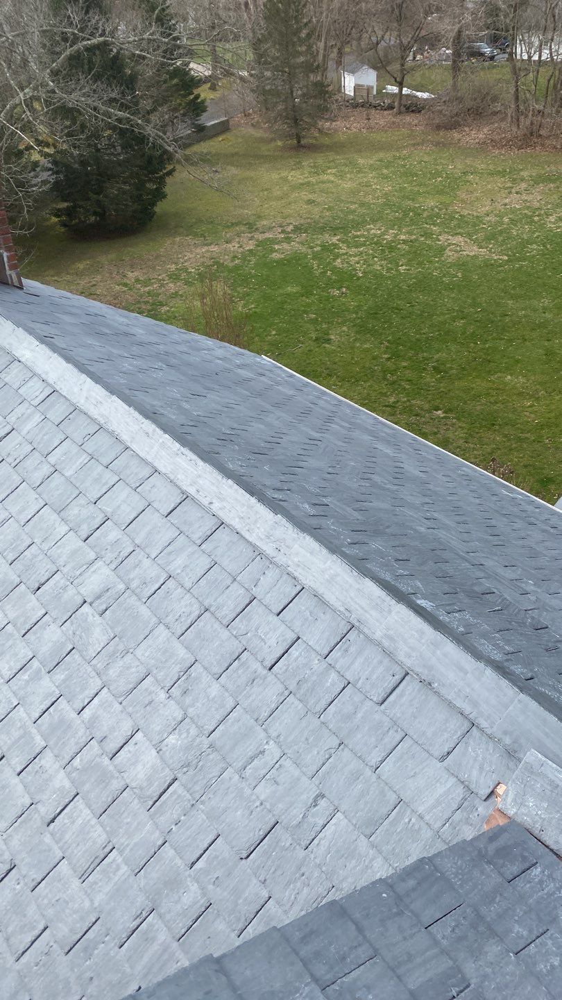 Residential Roofing Installation using Vermont Slate by A Plus Exterior