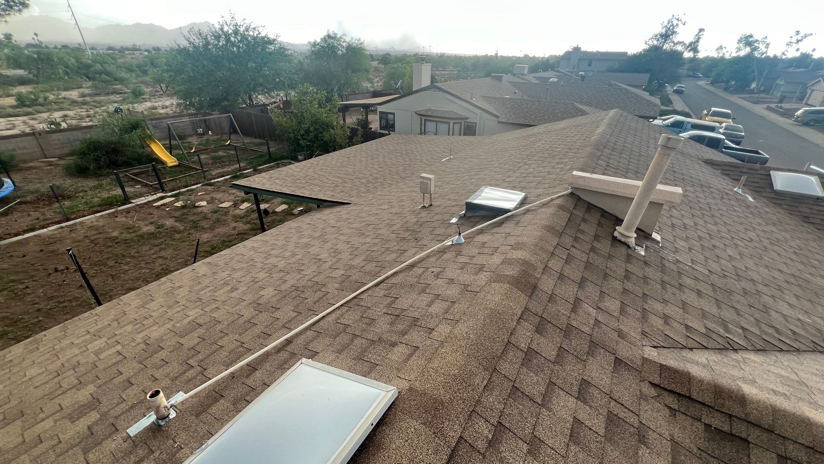 Desert Tan Shingles by Reimagine Roofing