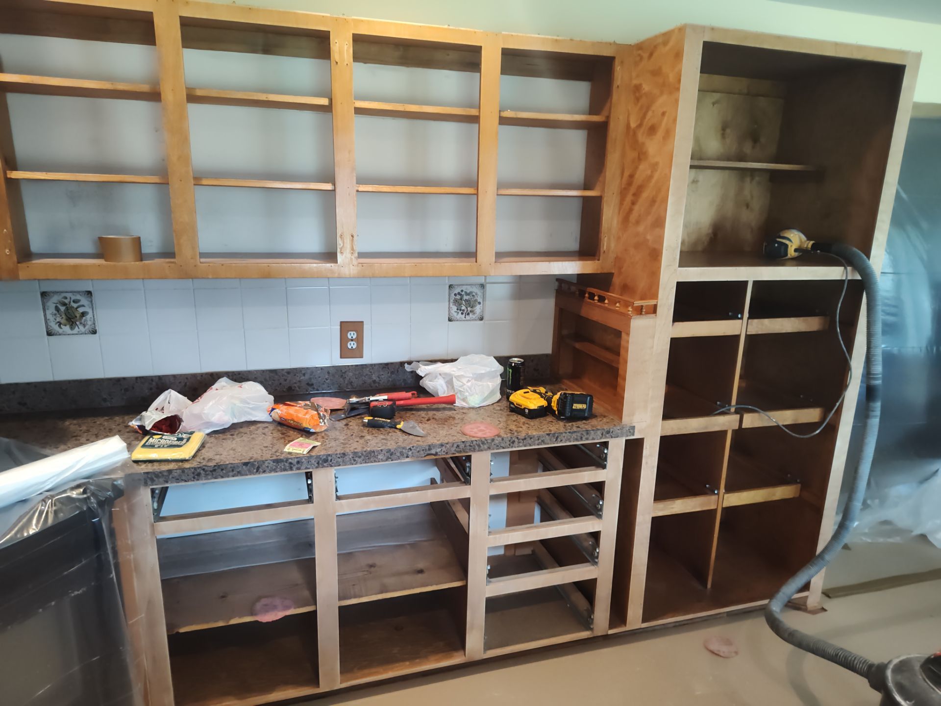Remodel Kitchen refinishing cabinets by Cornerstone Home Builders, LLC