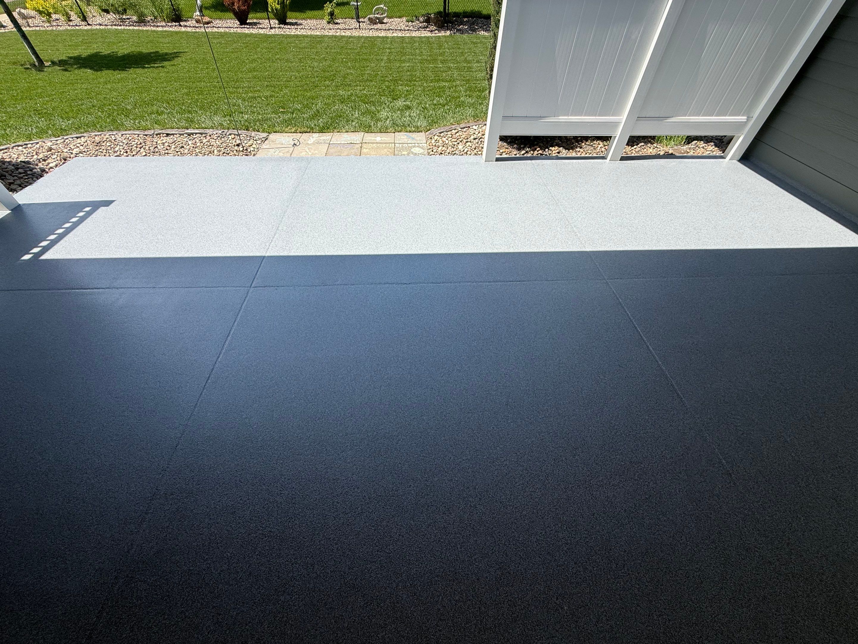 Polyurea Patio Floor Coating in Starry Evening for Sioux Falls Home by Select Painting, Coatings & Garage Cabinets