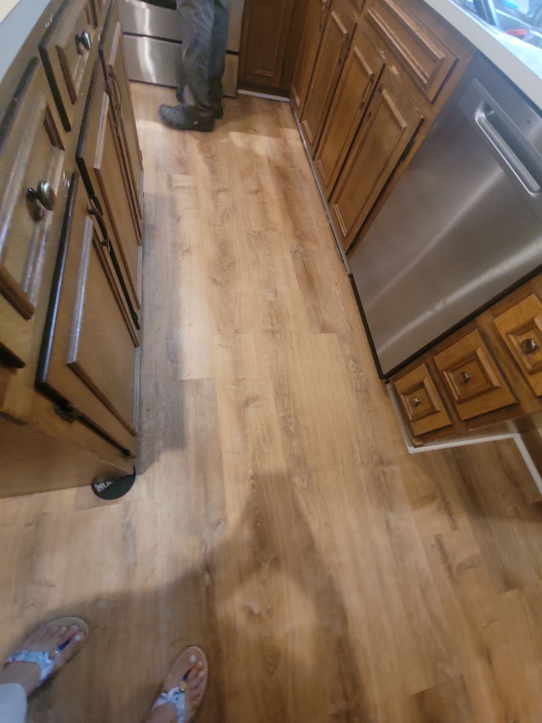 A Pathway to Personality – A Two-Tone Kitchen Transformation in Apex by Elite Remodeling and Design LLC