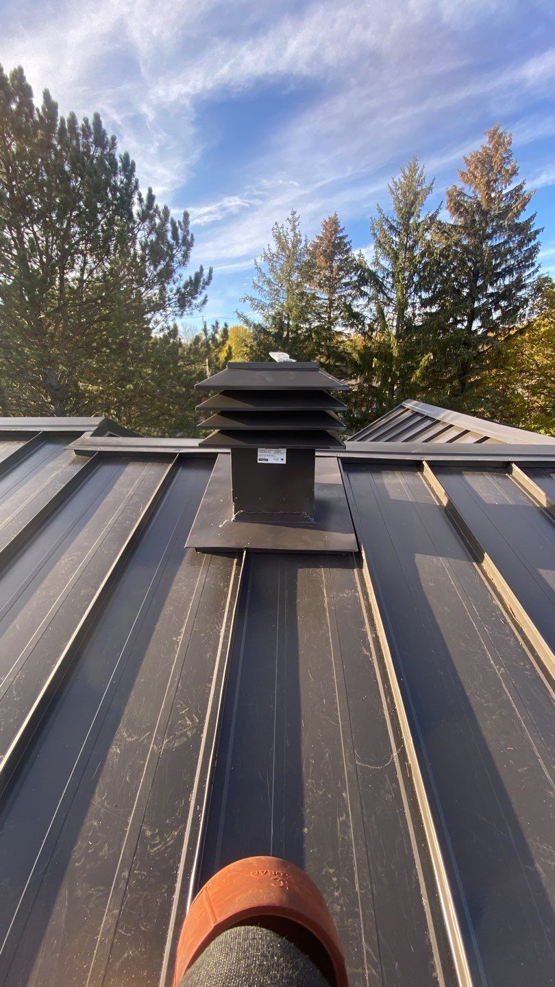 Residential Roofing Installation using 16" Standing Seam Panels by Jay Carter Roofing & Sheet Metal