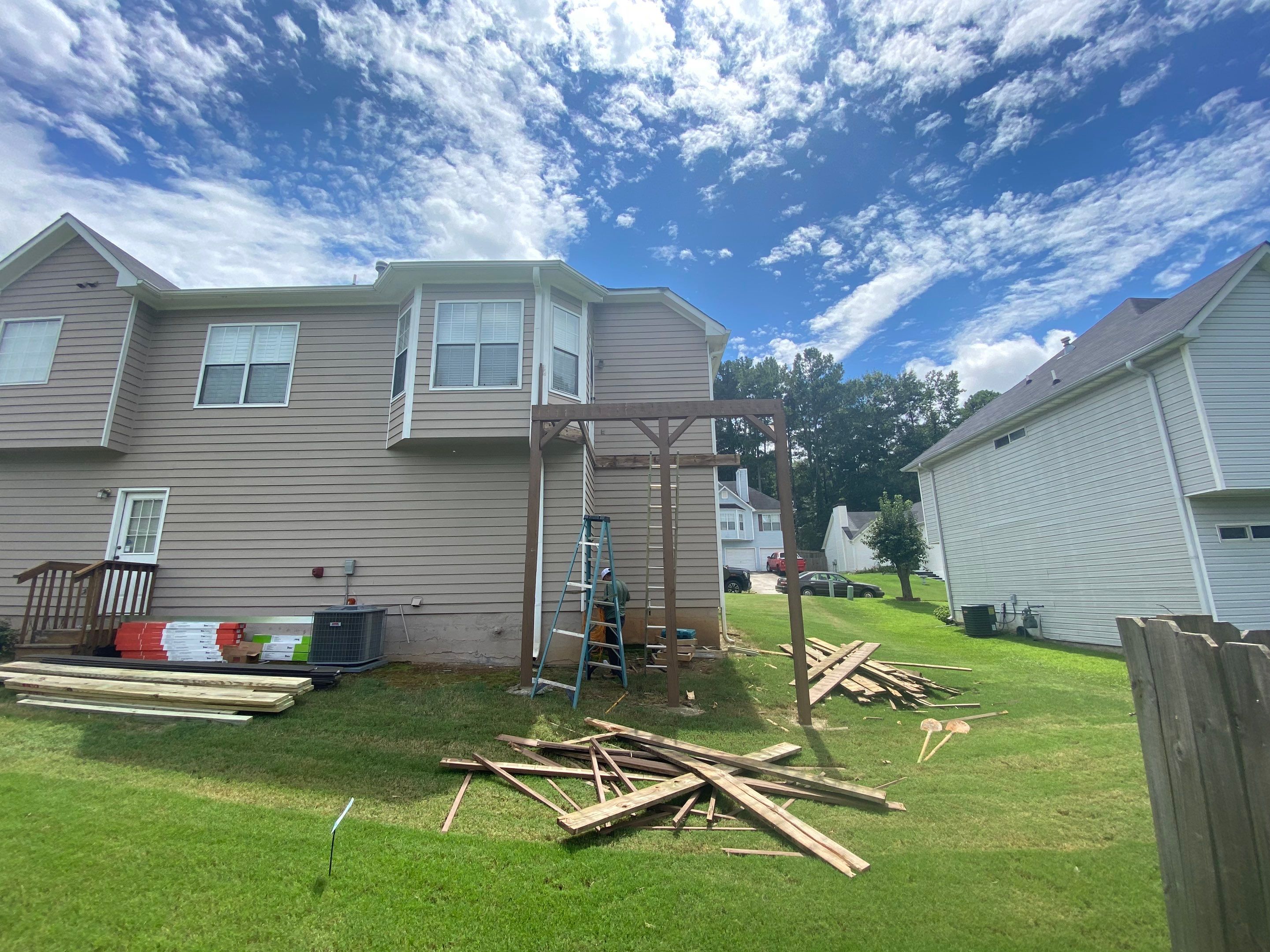 Elevated Wood Deck and Composite Step Replacement in Ellenwood by Swift Home Renovations 