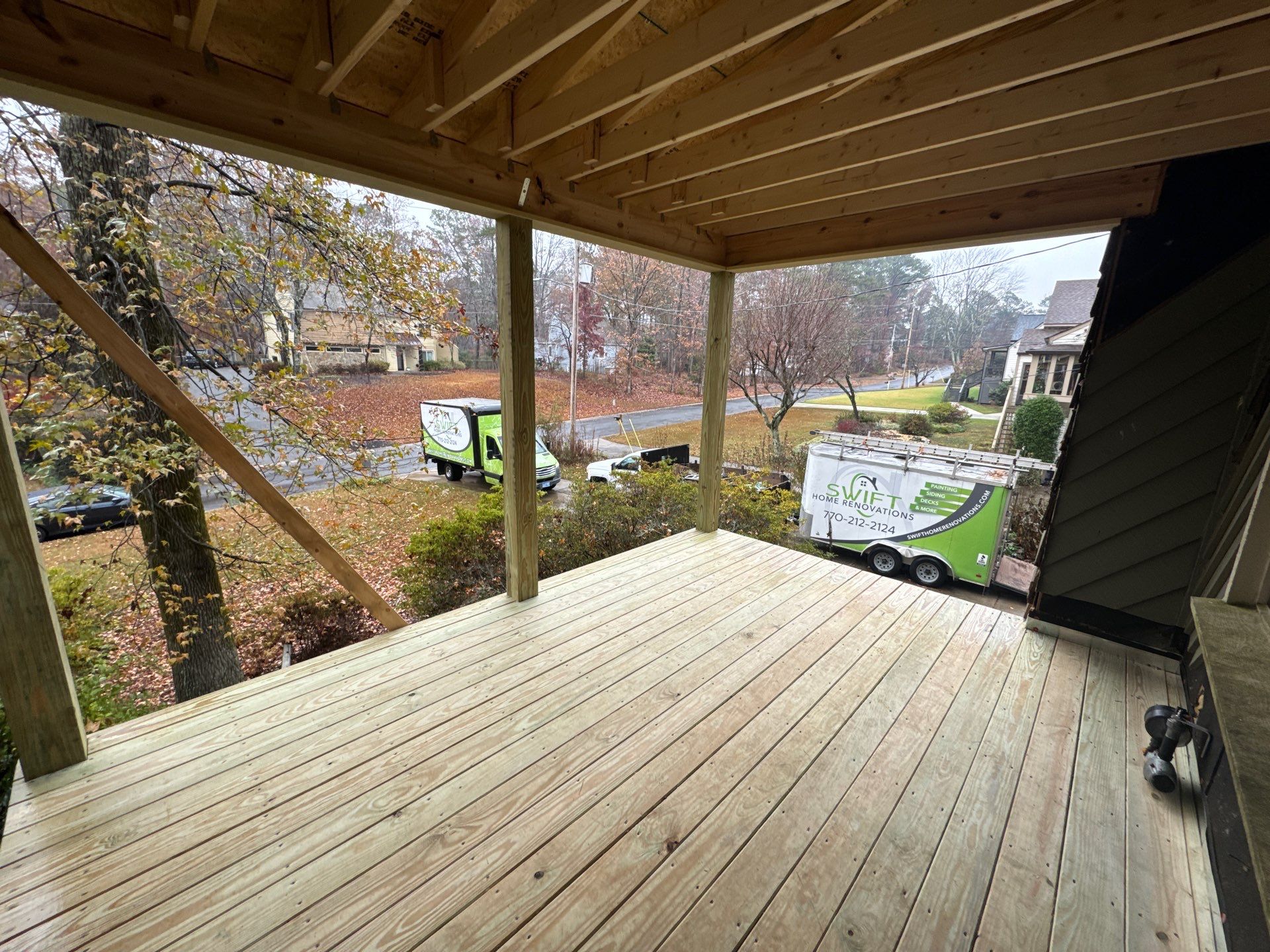 Elevated Wood Deck and Siding Replacement in Marietta by Swift Home Renovations