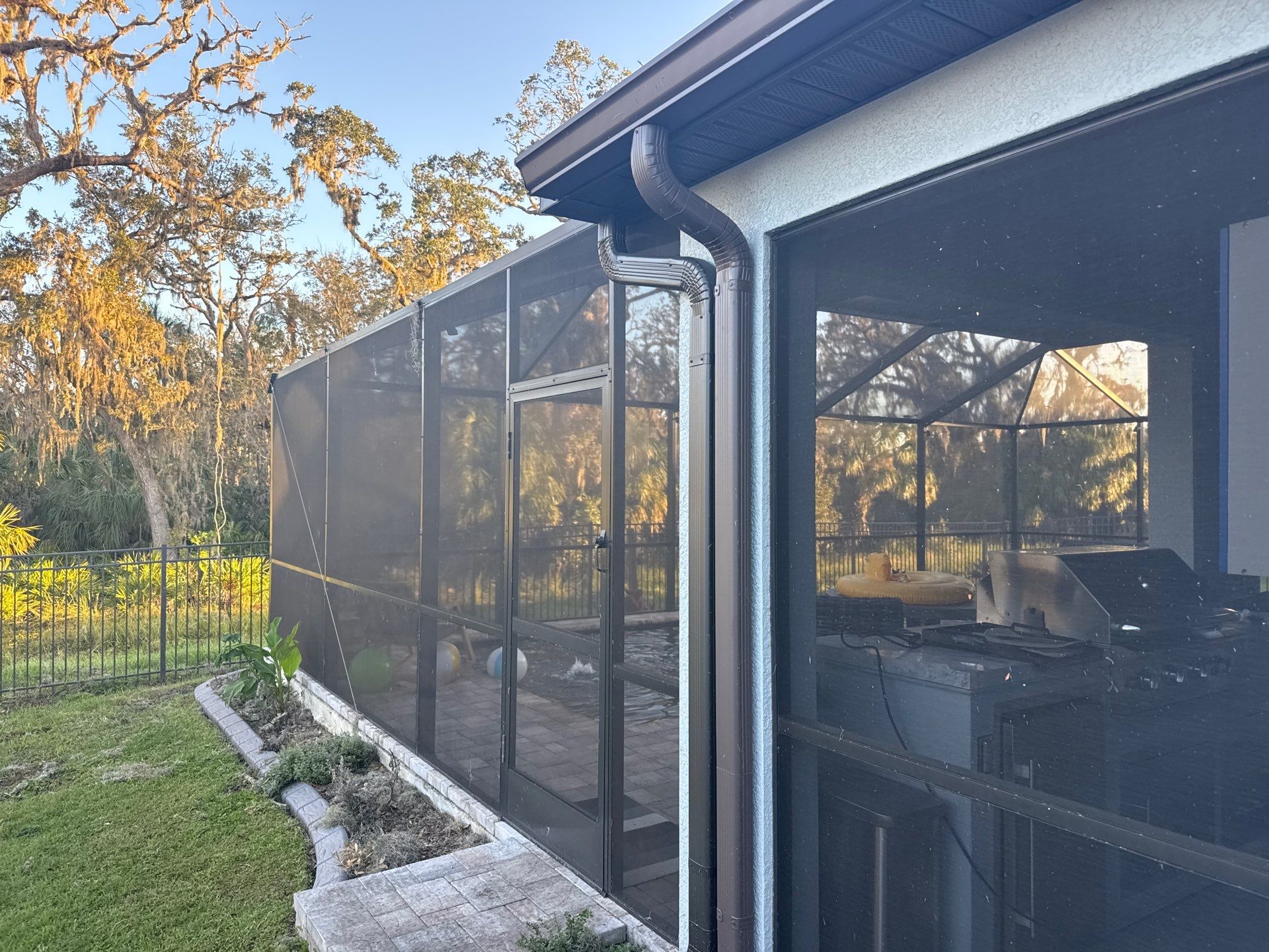 Post-Hurricane Gutter and Screen Enclosure Cleaning in Palmetto, FL | Trevesta Community by Sunshine AquaWash
