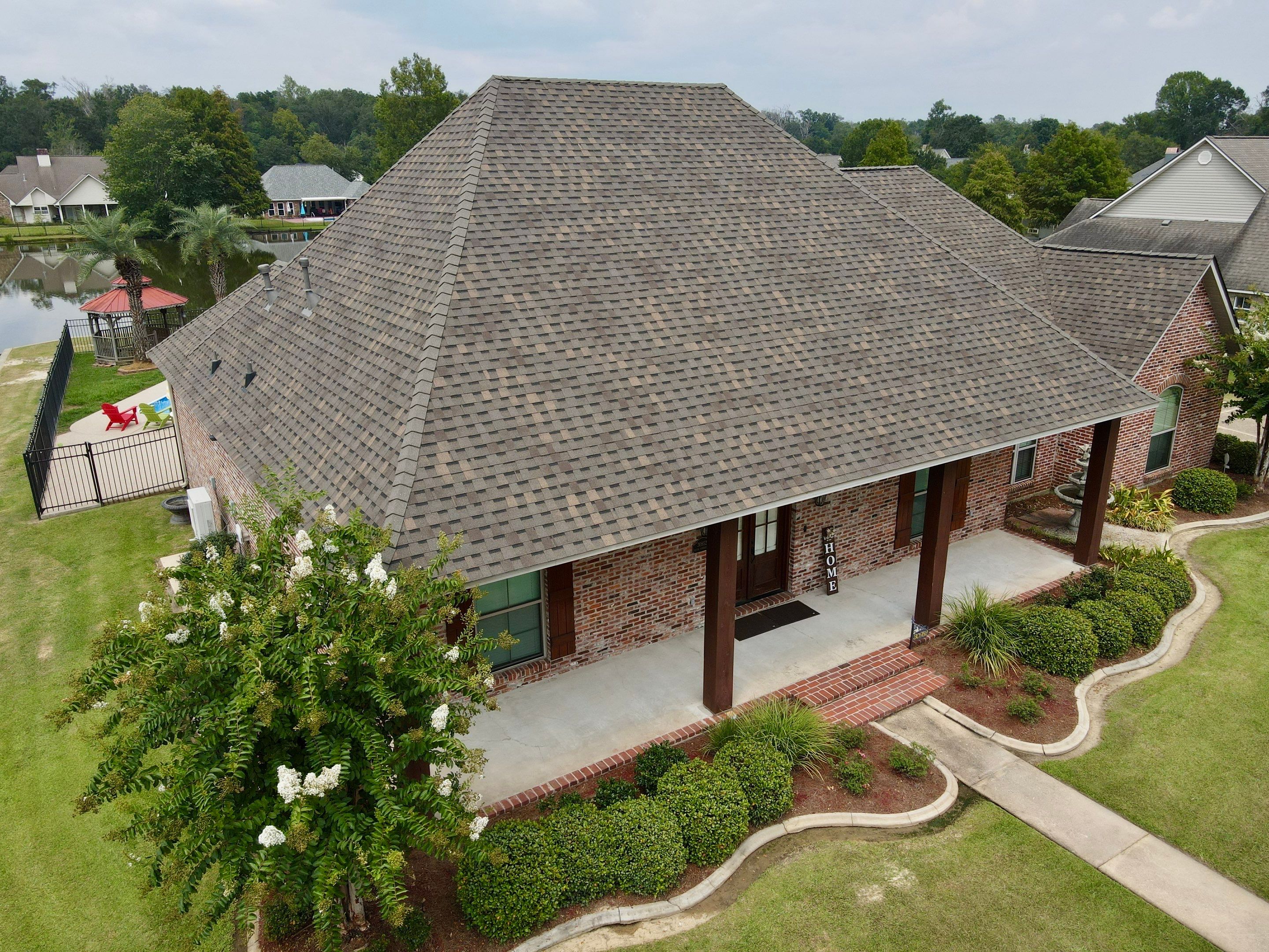 Residential Roofing Installation using Atlas Pinnacle Pristine Weathered Shadow and Atlas High Profile Ridge Cap by Top Team Construction