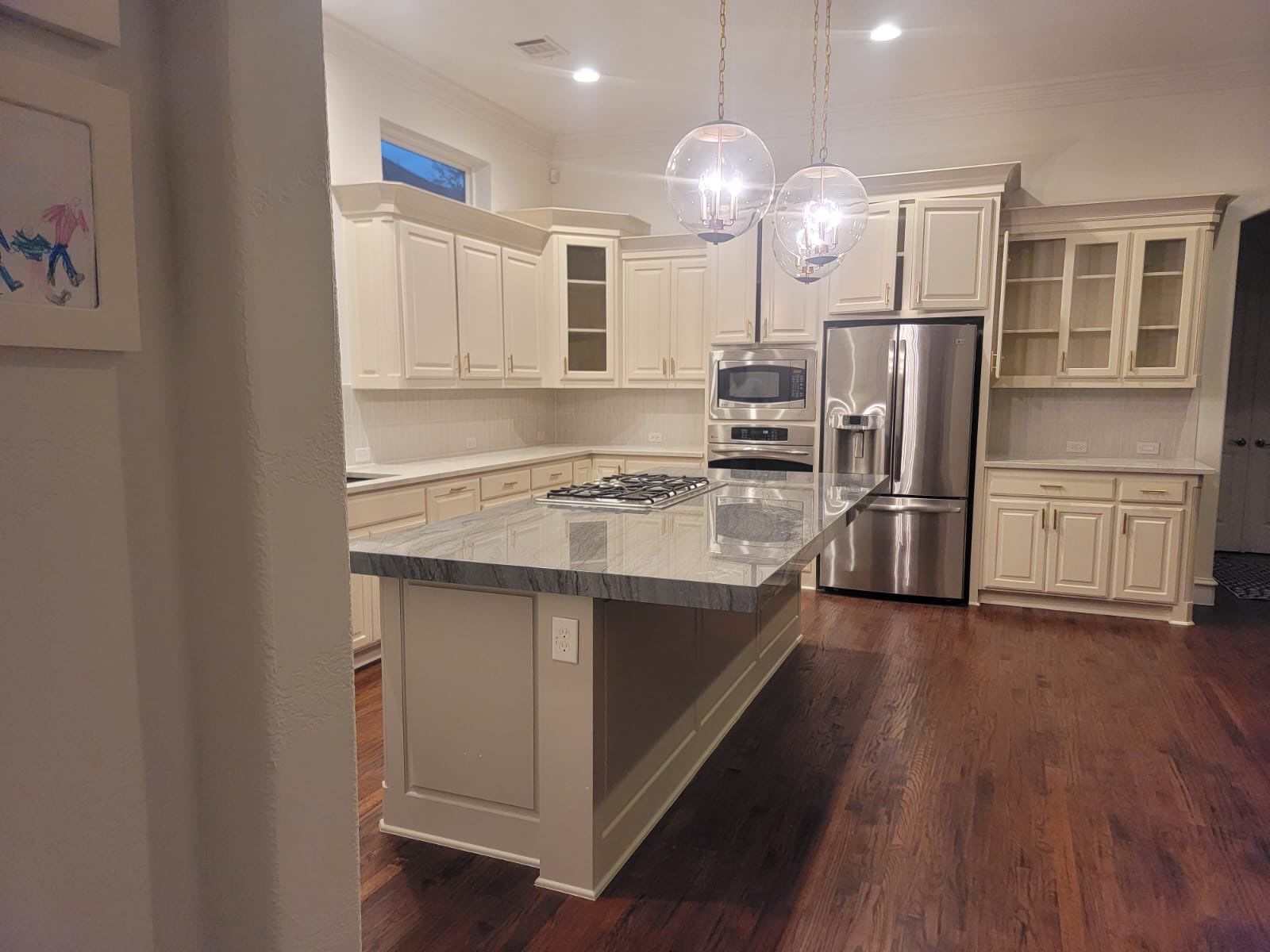 Kitchen Remodel using Quartzite by SLM General Contractors & Roofing