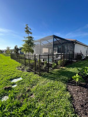 Aluminum Fence Installation using Bronze 3 Rail Aluminum Fence