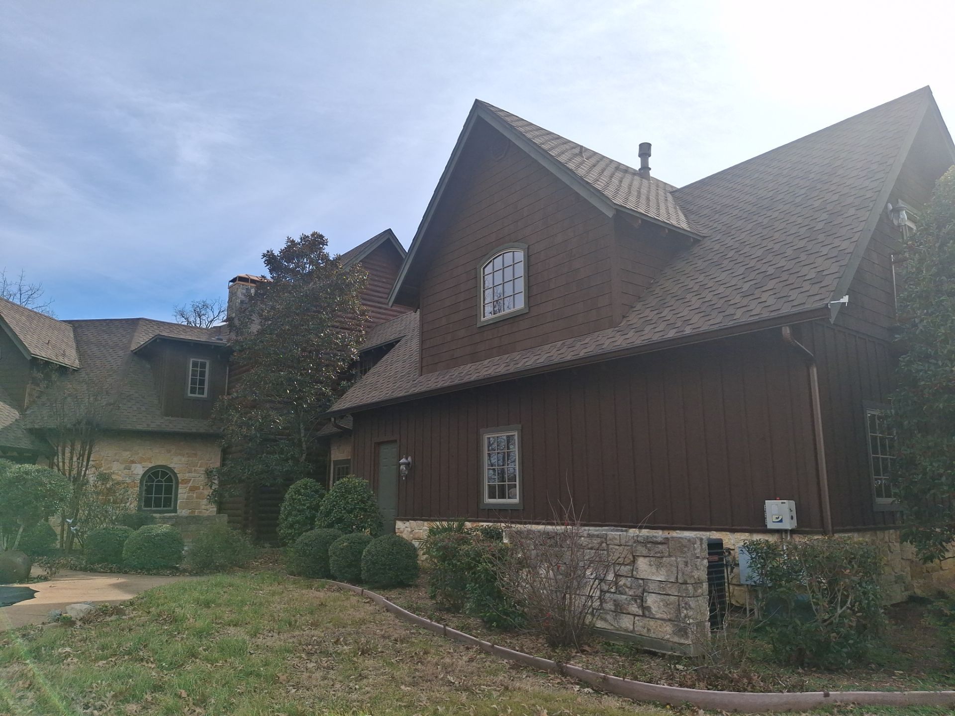 A Complete Exterior Refresh for a Custom Log Home & Property in Alba, Texas by Quality Coats Painting