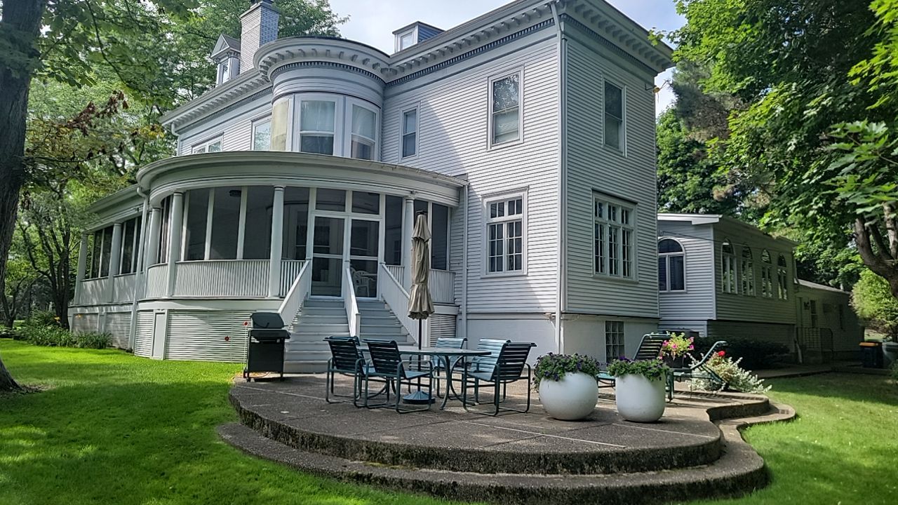 Housewashing  using Algaecide, soft wash soap by Northern Power Washing LLC.