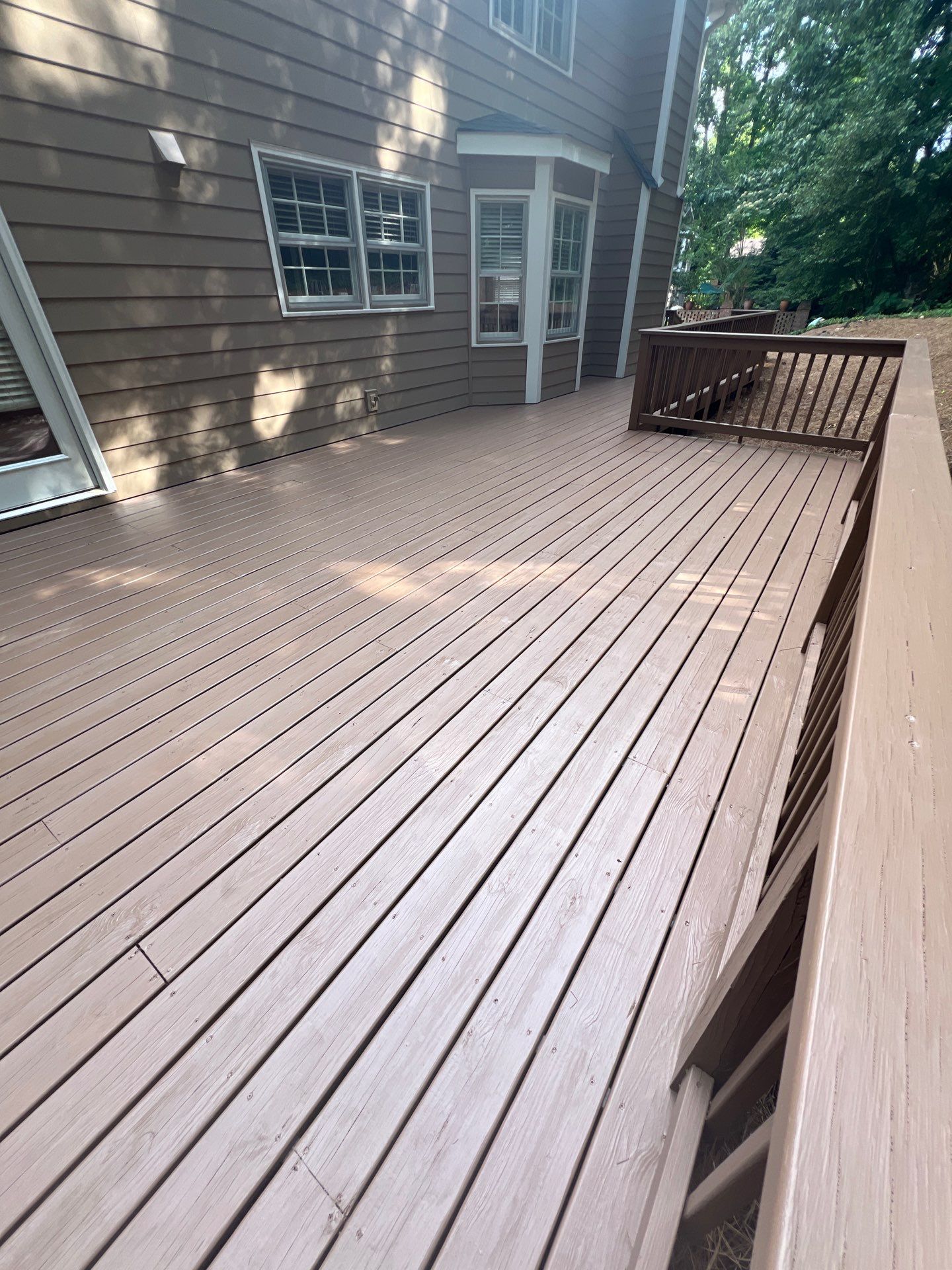 James Hardie Siding Installation, Rotten Wood Replacement, Porch Repairs, and Deck Resurfacing in Smyrna, GA by Nelson Exteriors 