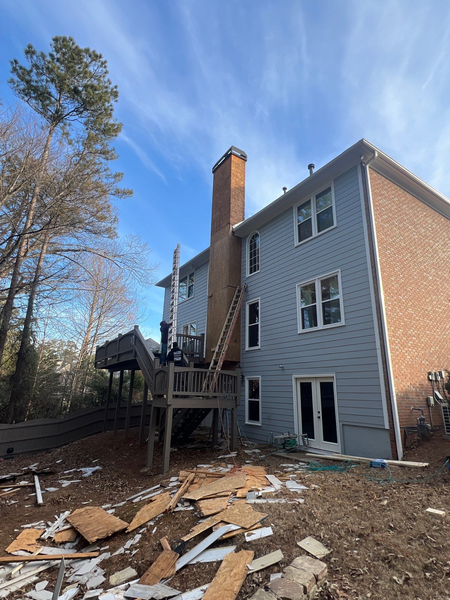 Chimney Siding Reconstruction and Full Exterior Painting in Marietta by Swift Home Renovations