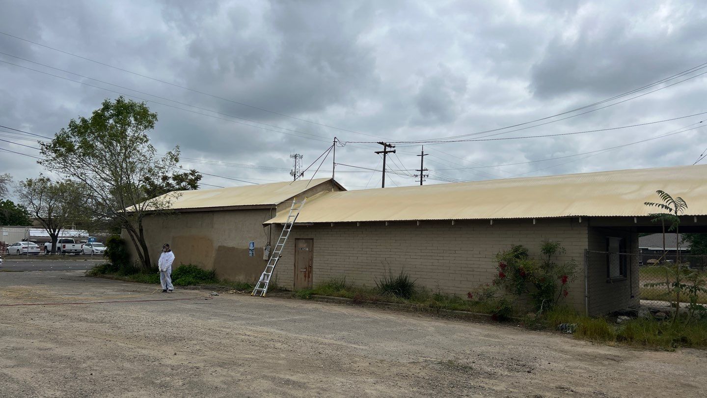 Spray foam and coatings using Conklin Benchmark/PUMA XL by Straight Edge Roofing Inc