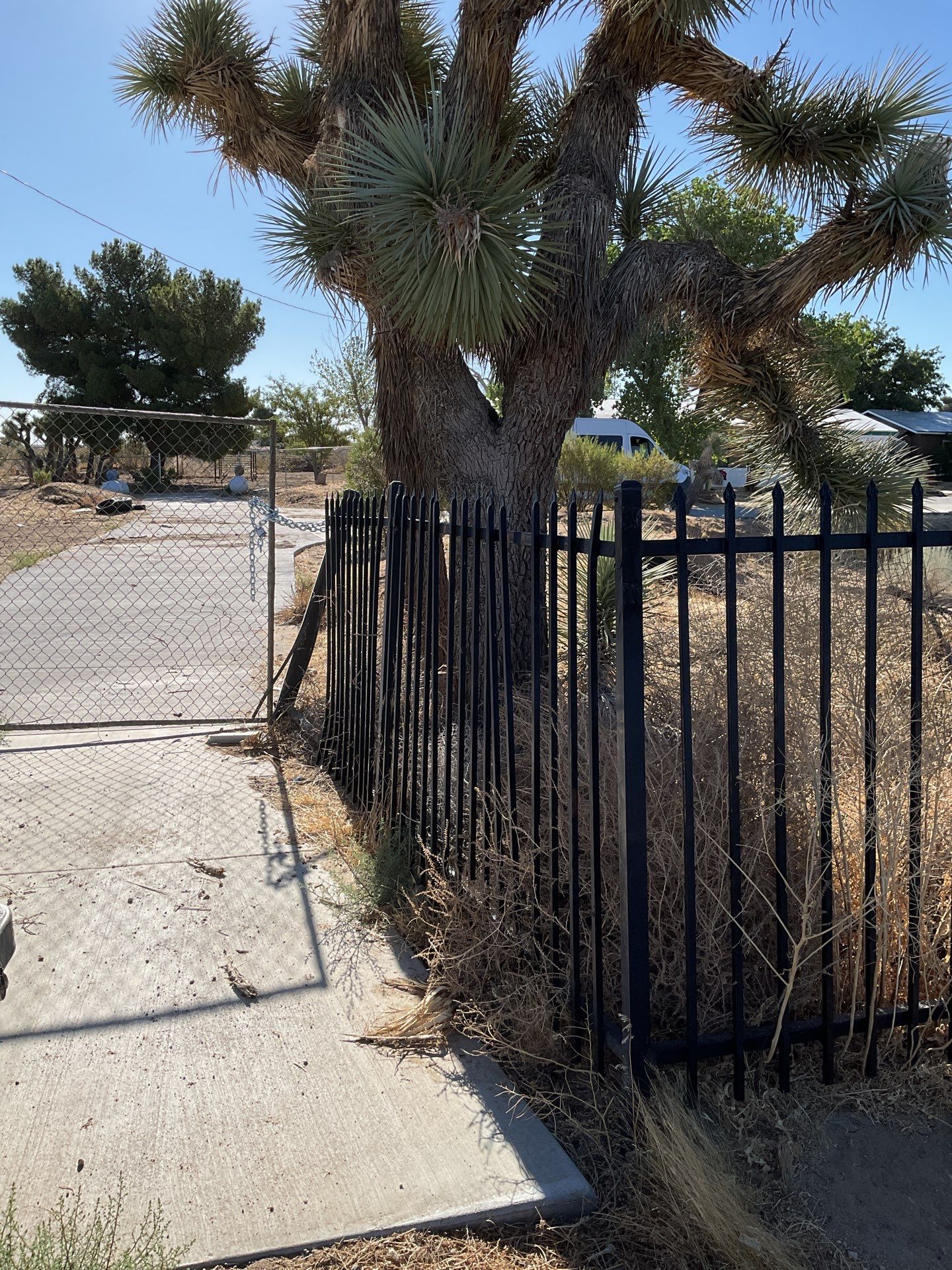Gate installation using Wrought Iron by Fence Guys Inc. 