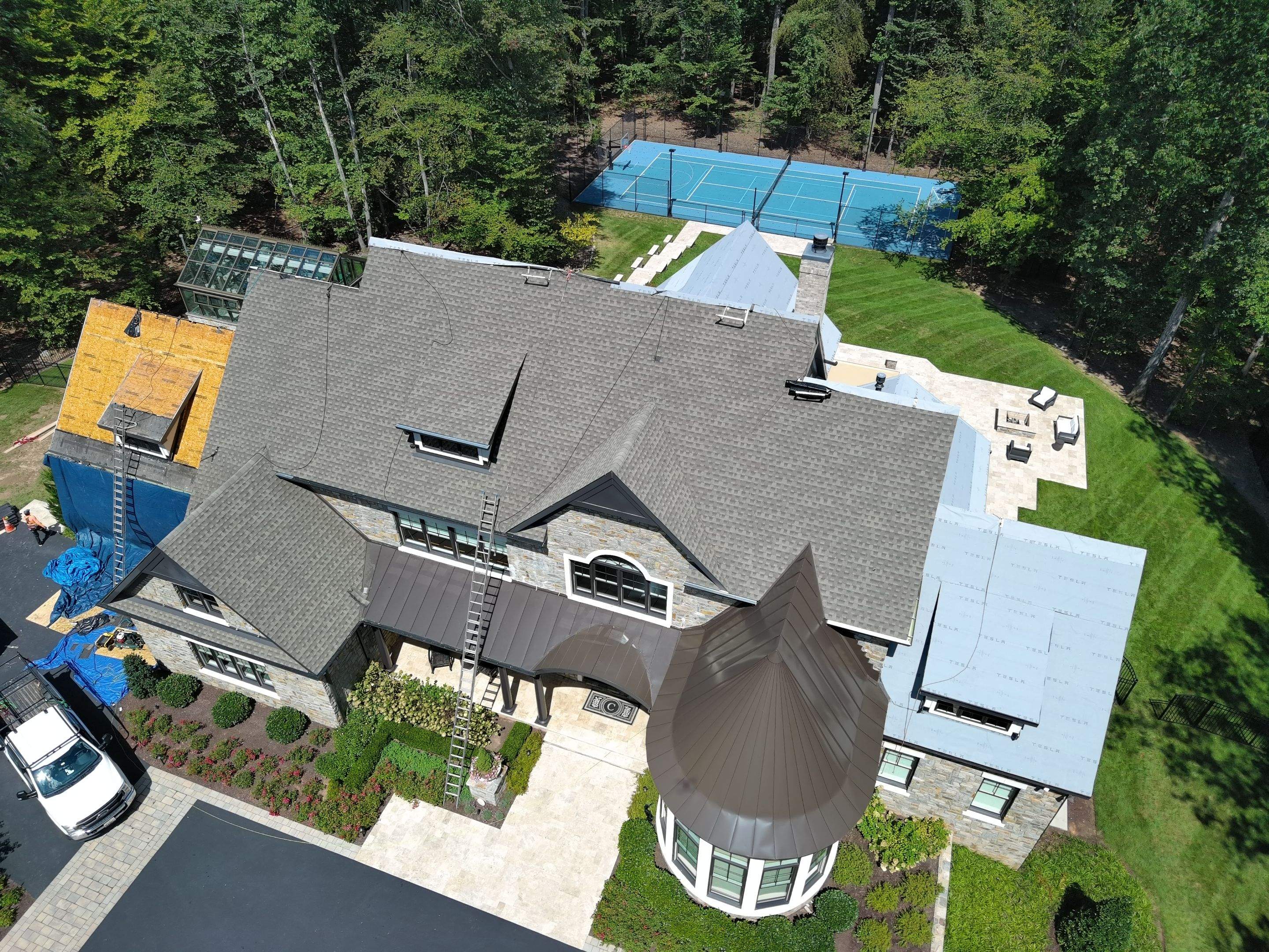 STUNNING Tesla Solar Roof in Virgina by American Home Contractors