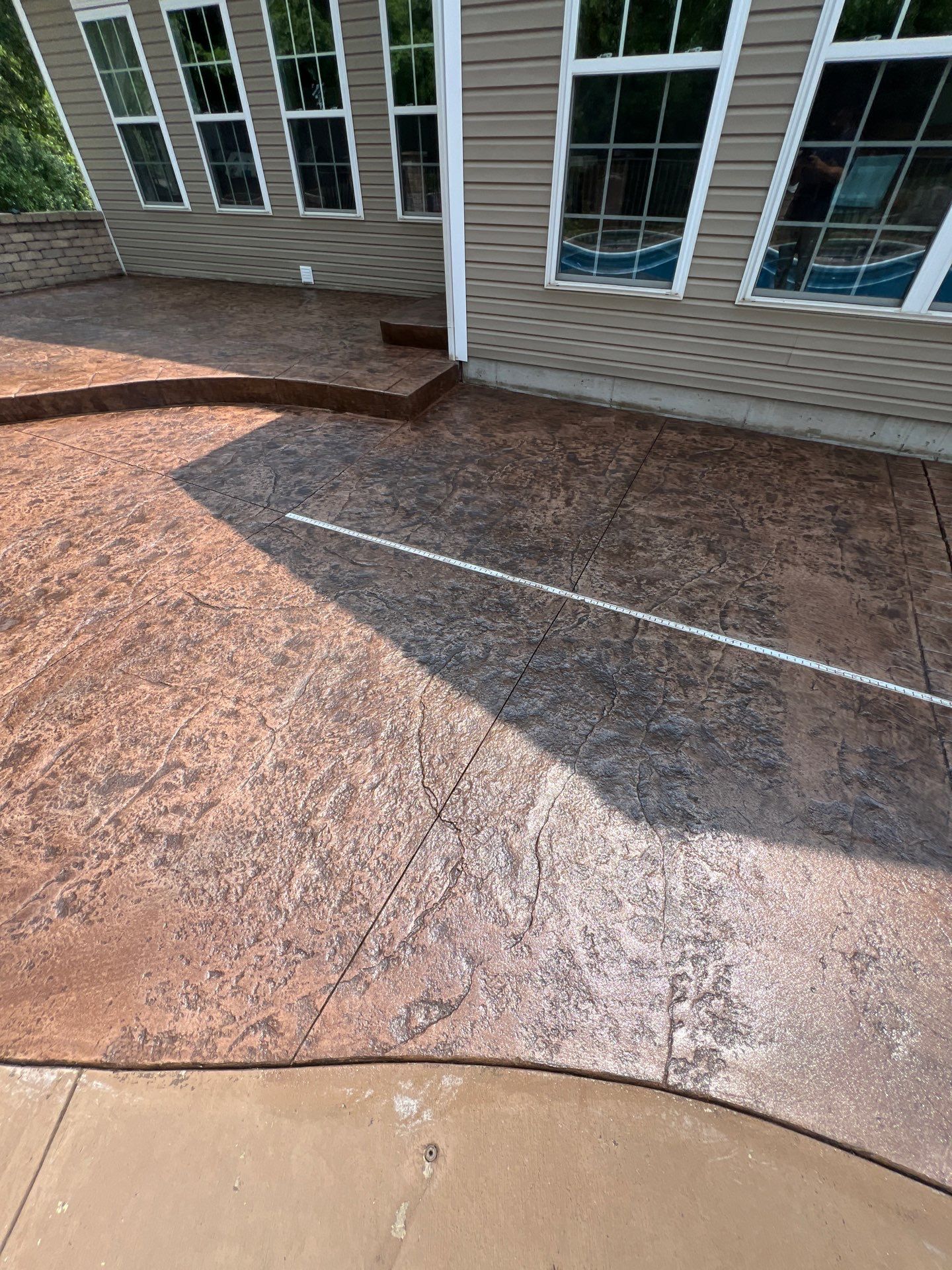 Sidewalk and pool patio Recolor/Reseal  by NG Masonry & Construction LLC
